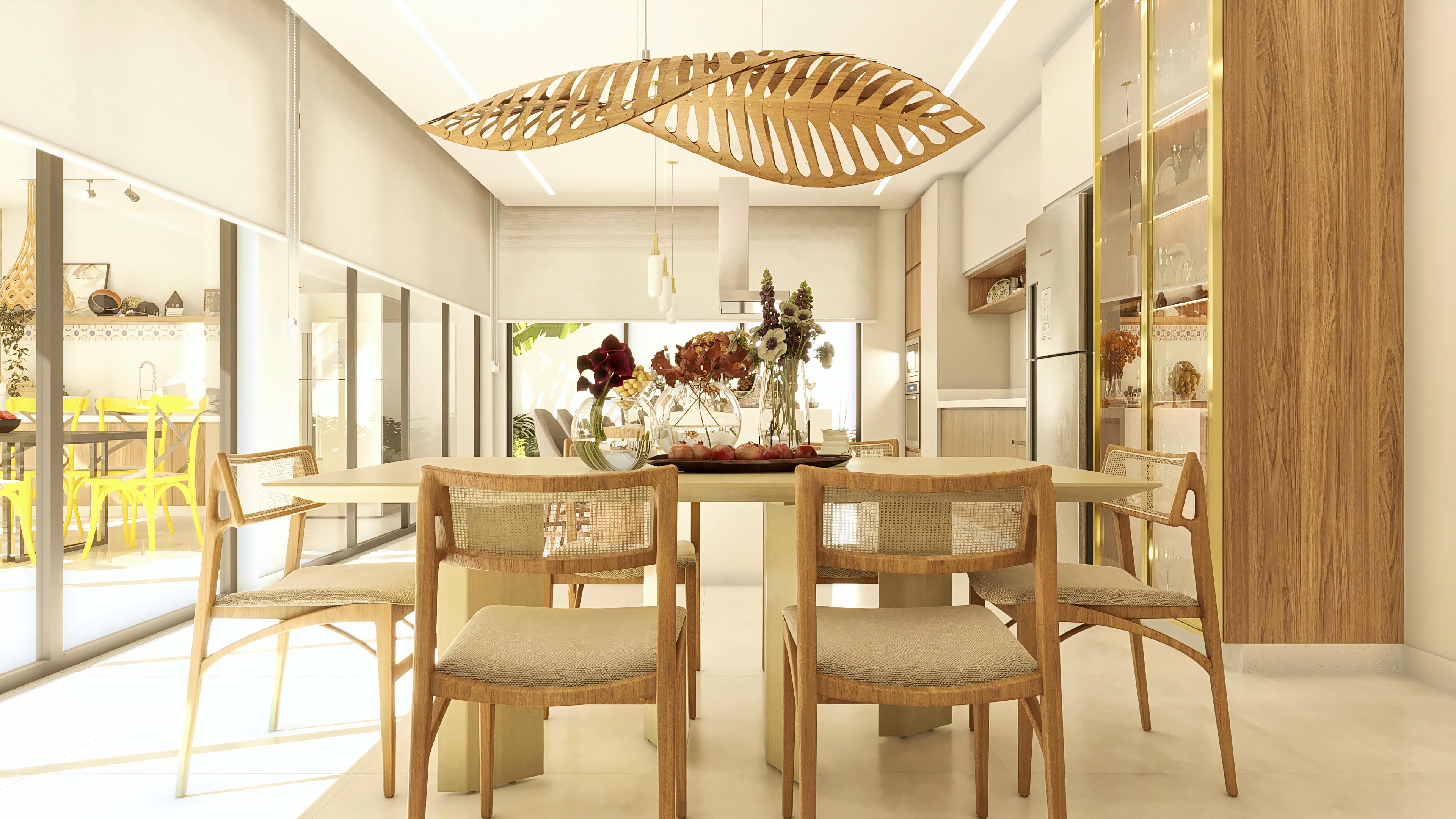 Sala de jantar integrada com cozinha, destacando mesa de madeira clara com cadeiras em palha e detalhes em madeira, iluminação escultural e armário espelhado.