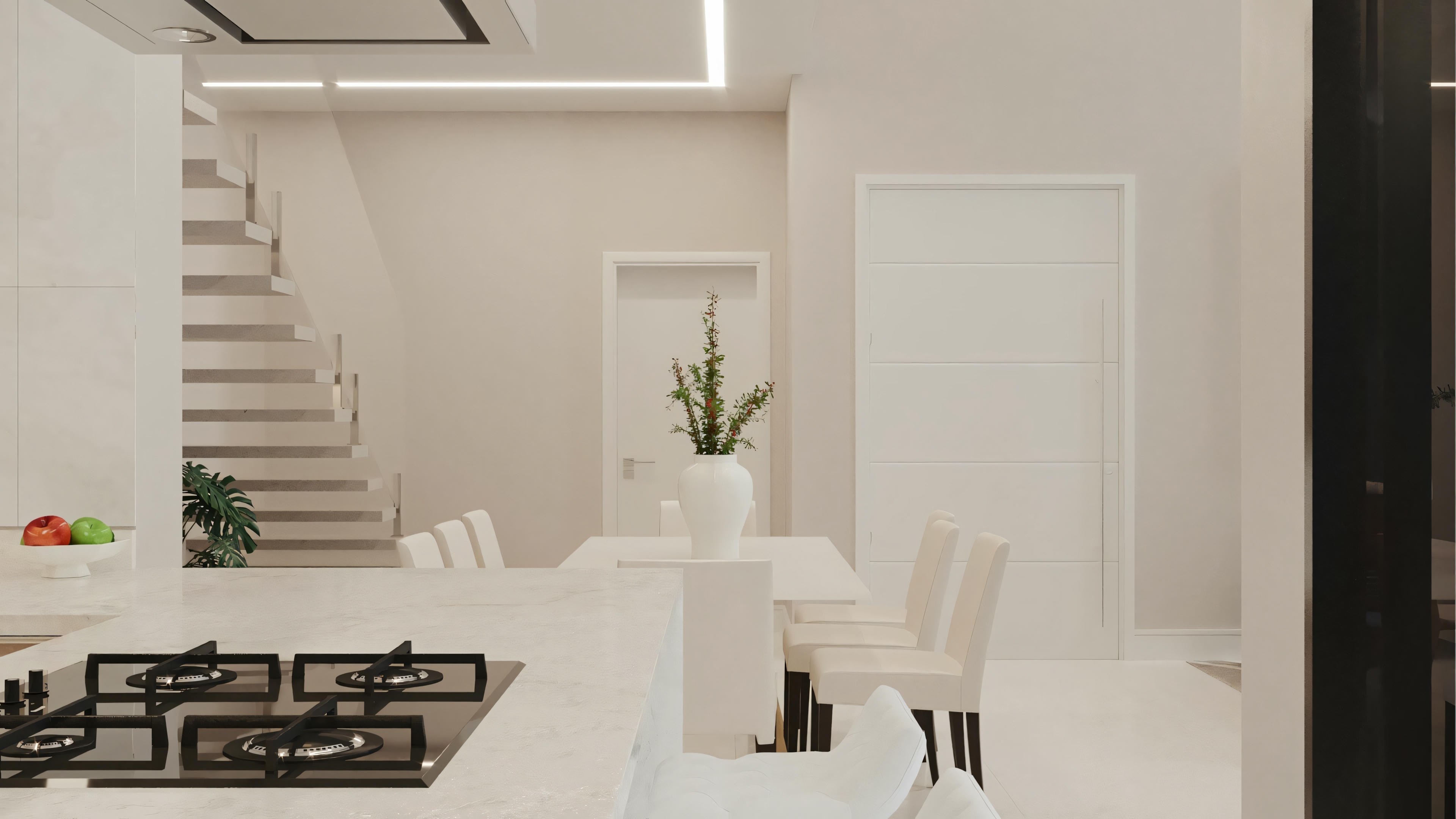 Una cocina moderna e iluminada con gabinetes blancos, estufa empotrada y área de comedor al fondo.