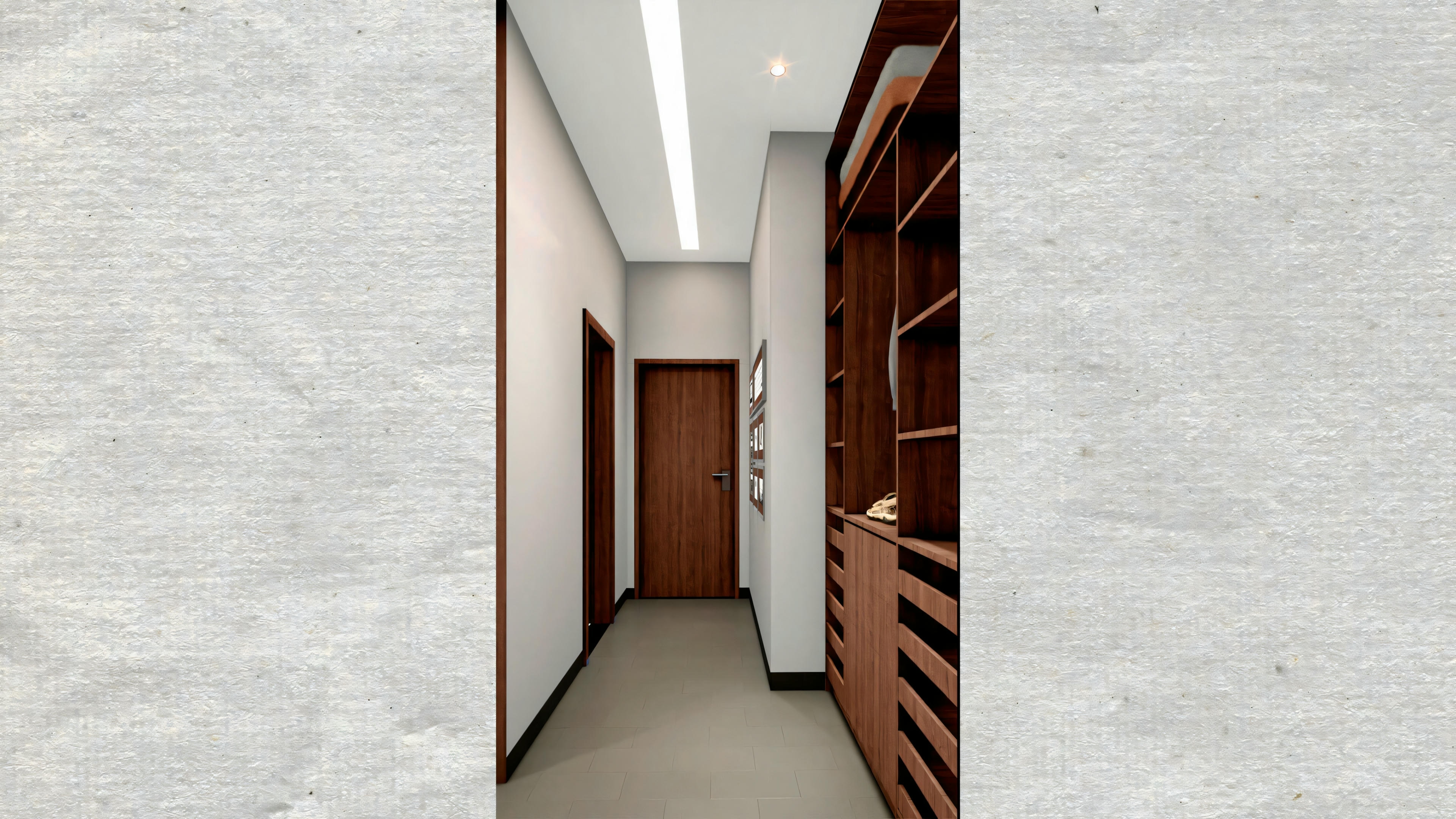 An interior space with a corridor leading to a room with wooden doors and white walls.