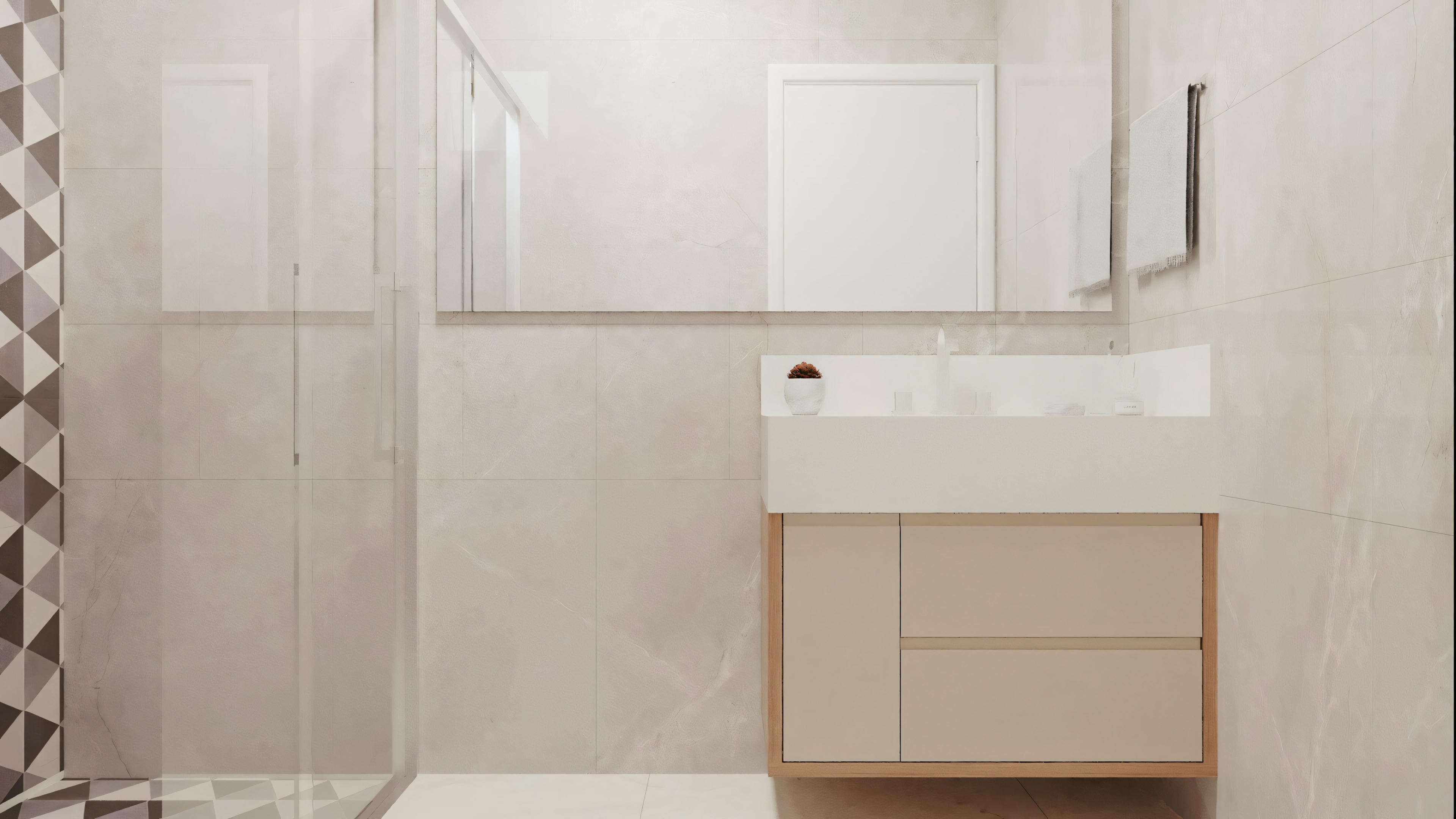 A bathroom with white walls, a shower area with a transparent partition, a white sink cabinet with drawers, and a mirror above the sink.