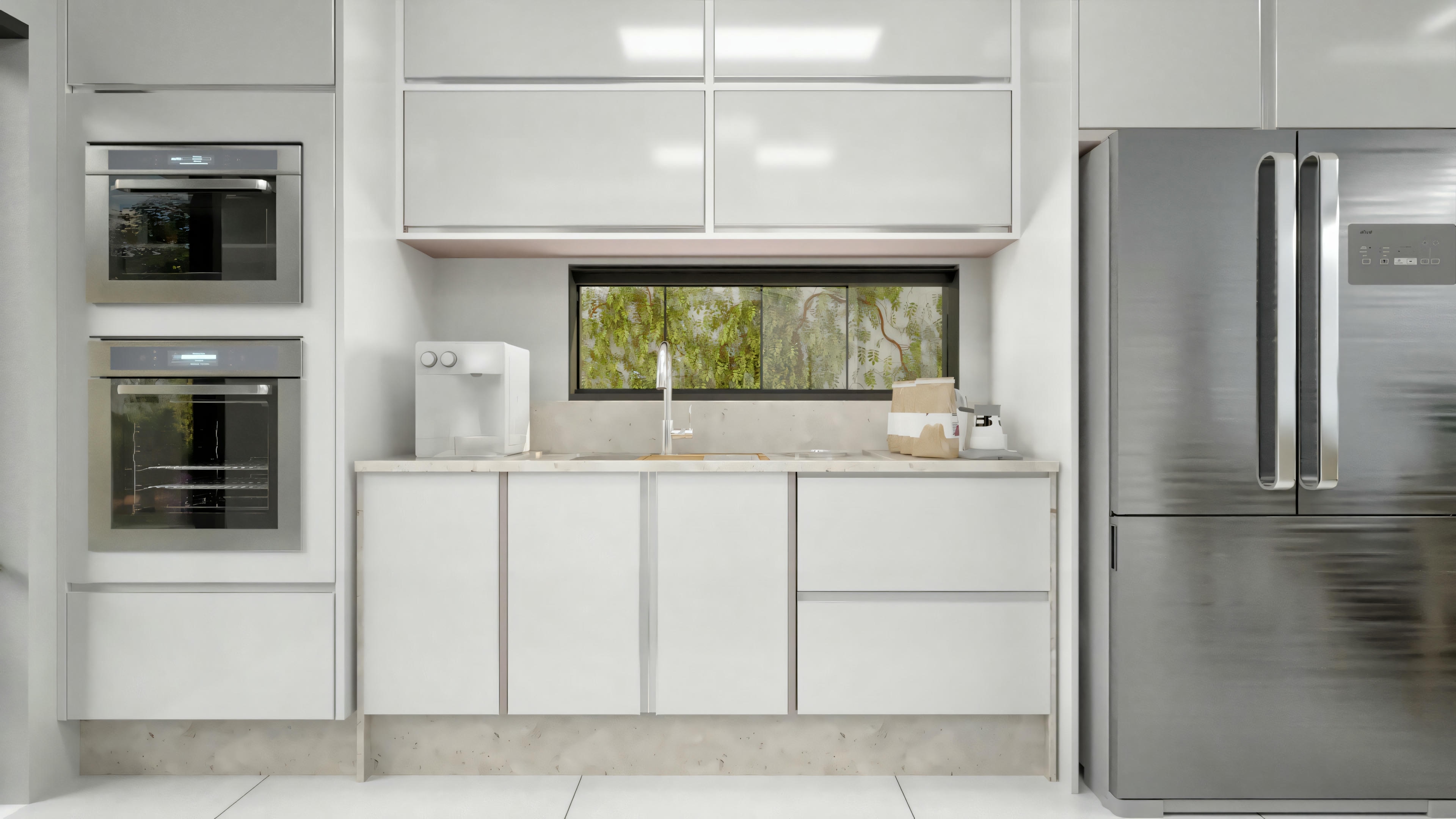 A modern kitchen with white cabinets, stainless steel appliances, and built-in lighting.