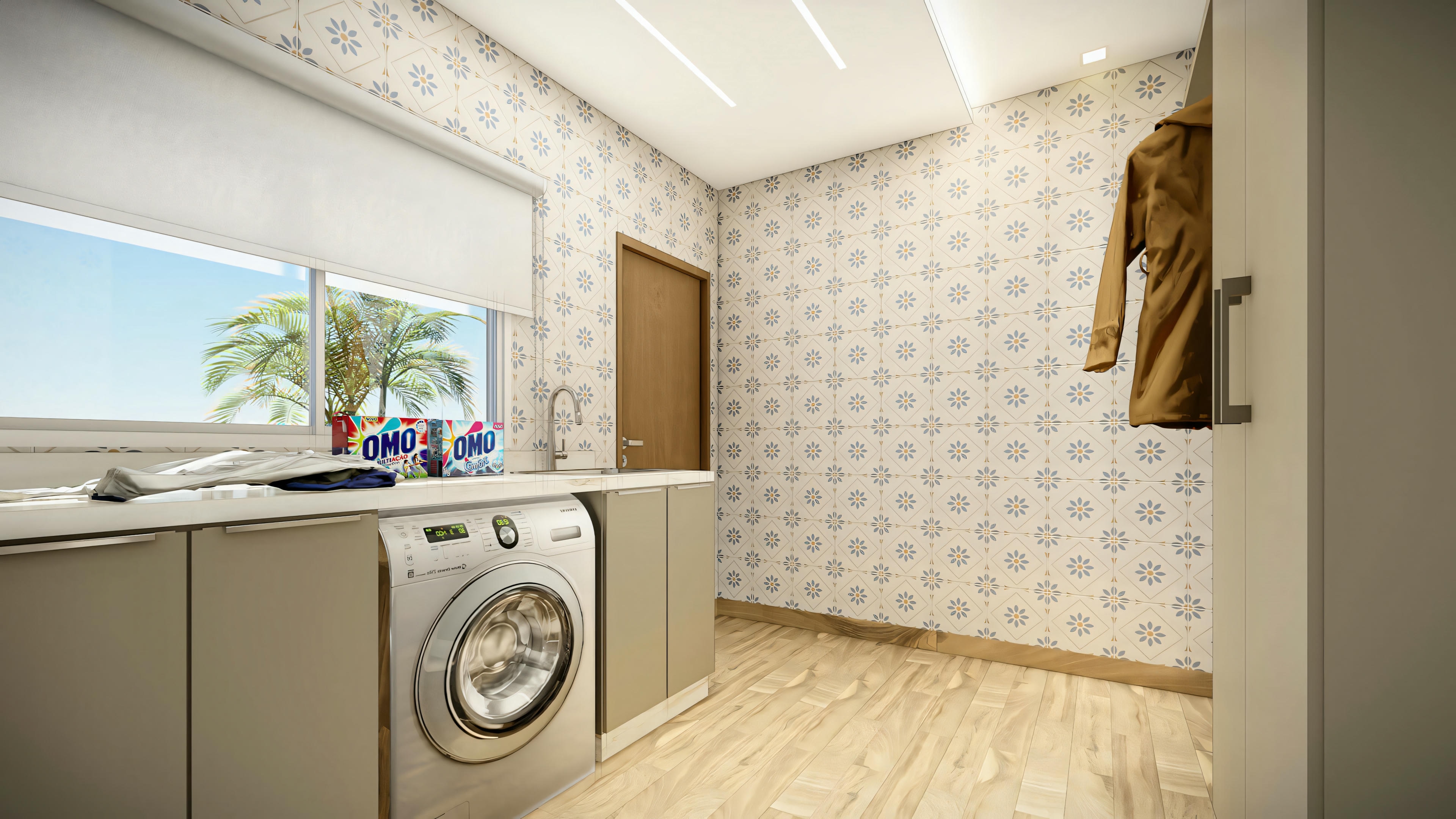 Modern laundry area with washing machine, sink, window with blinds, and folded towels on the counter.