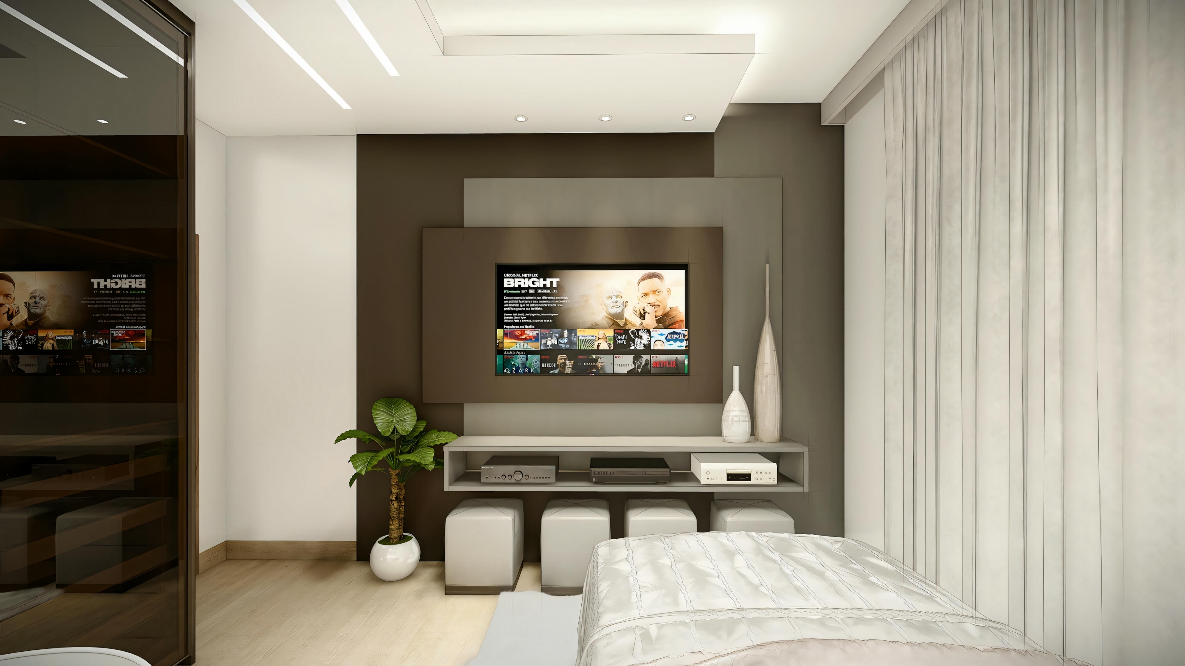Habitación moderna con cama grande en primer plano y zona de estar con sofá y televisión al fondo, separadas por divisorias parciales.