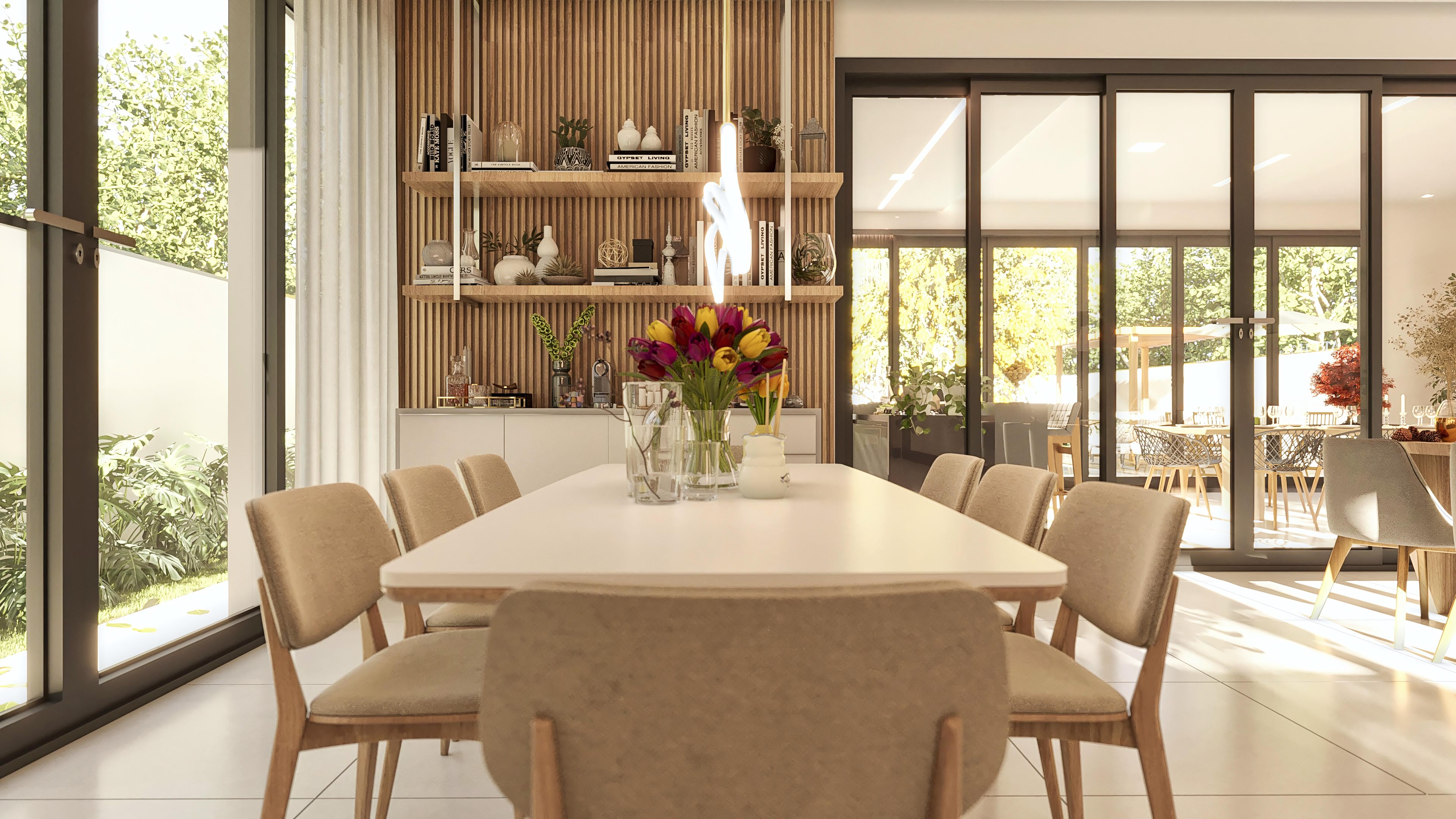 Internal environment of a modern single-story house with an elegant dining table, comfortable chairs, and a wooden bookcase. Large glass windows integrate the space with the exterior.