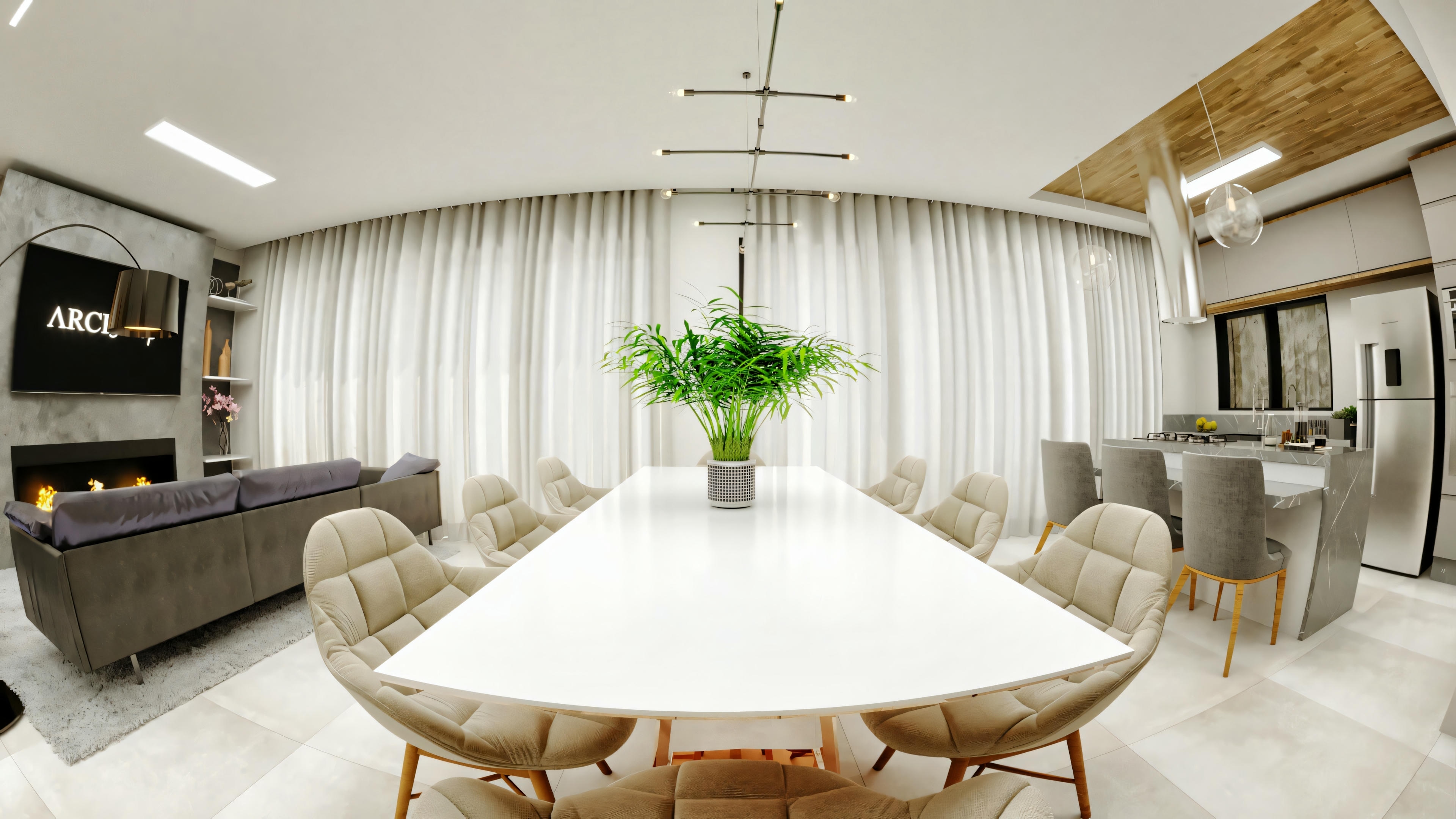 Large dining room with long rectangular table and upholstered chairs, integrated with the living room with sofa, fireplace, and TV panel, in a modern type 4 house with kitchen in the background.