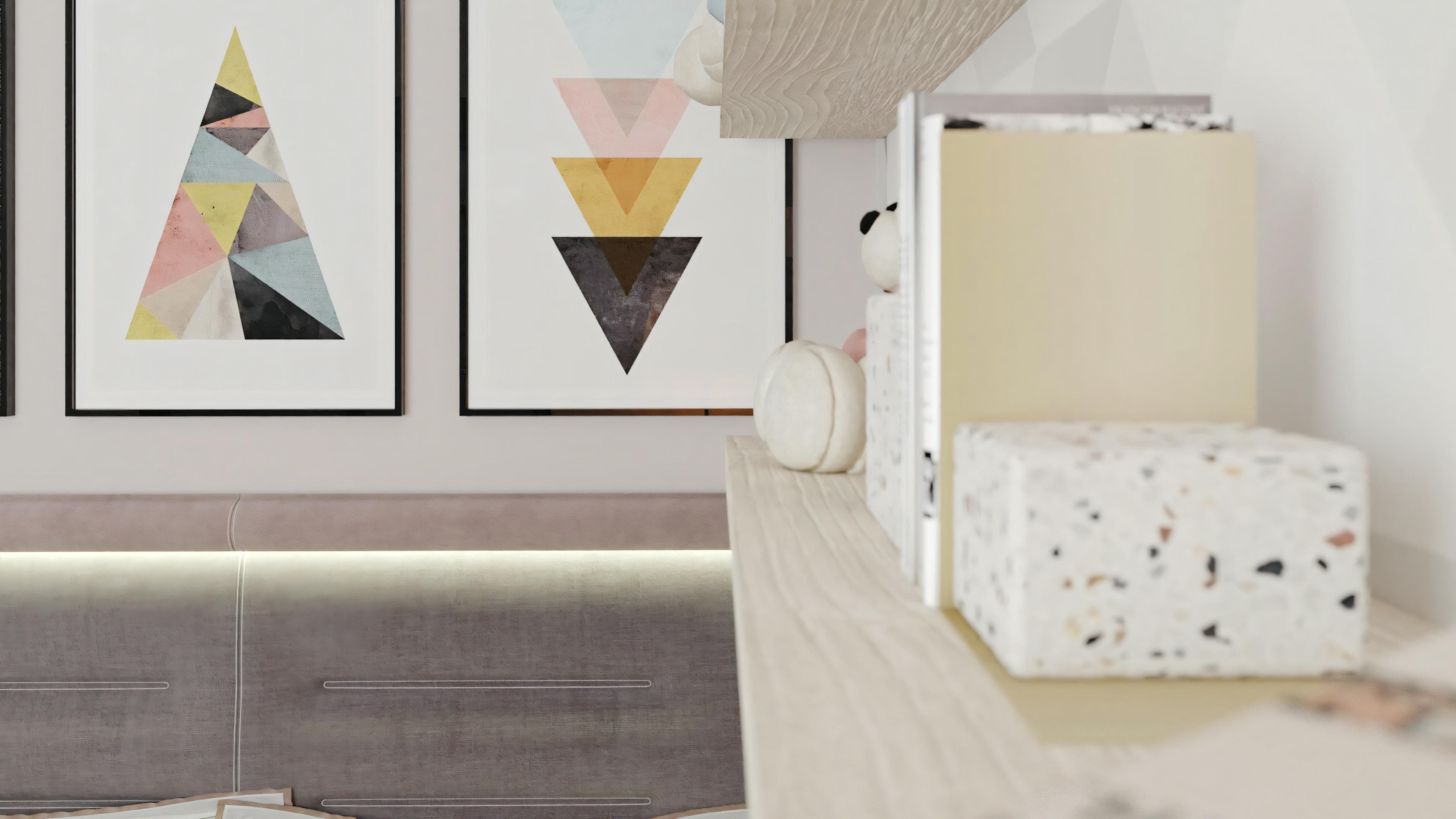 Modern living room with a sofa and decorative pillows.