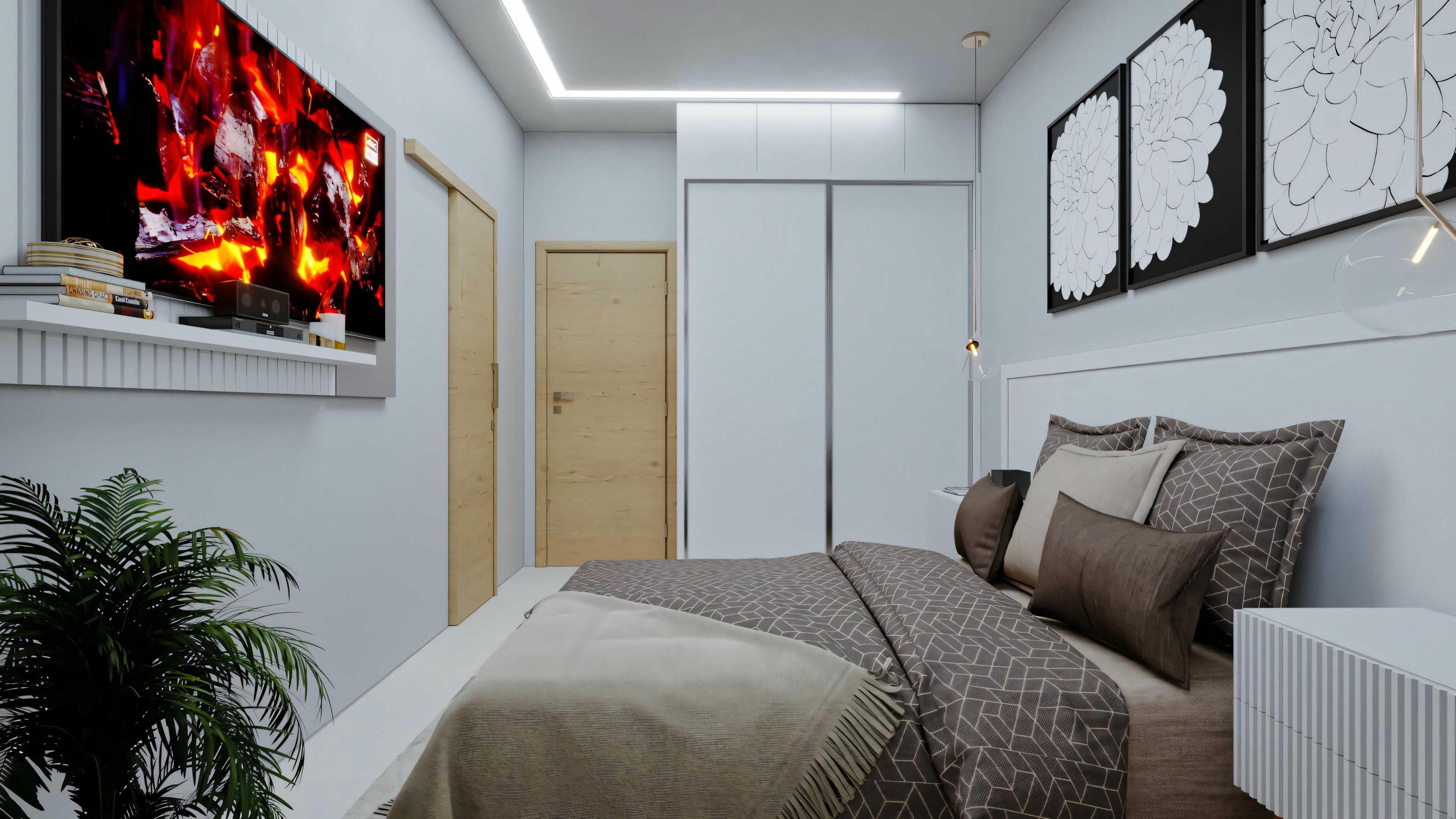Um quarto moderno com uma cama com roupa de cama cinza e vários travesseiros. Na parede oposta à cama, há uma televisão de tela plana montada exibindo uma imagem de fogo.