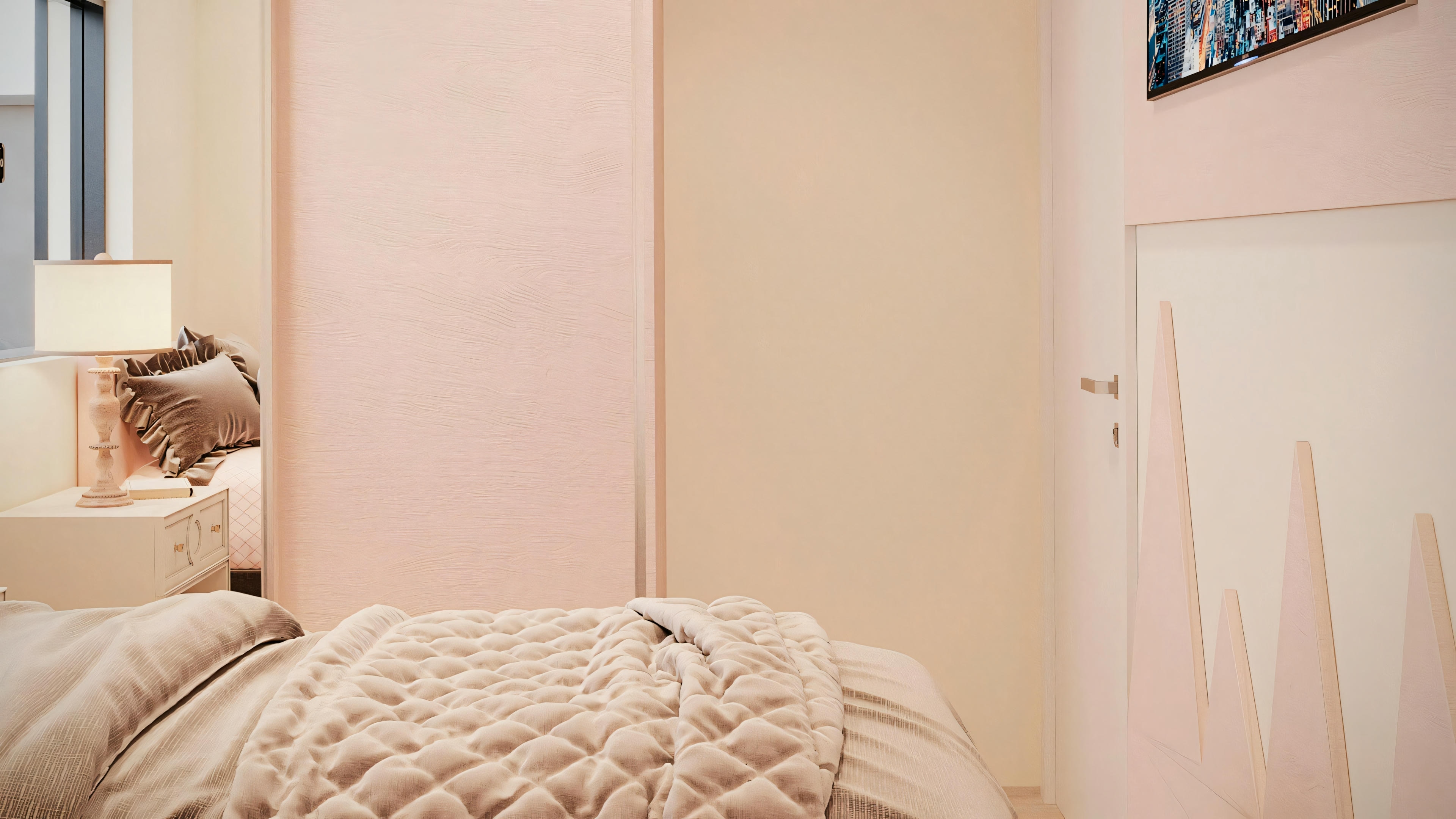 A bedroom with beige bedding, positioned against a pink wall; the edge of a white door or panel is also visible on the right side.
