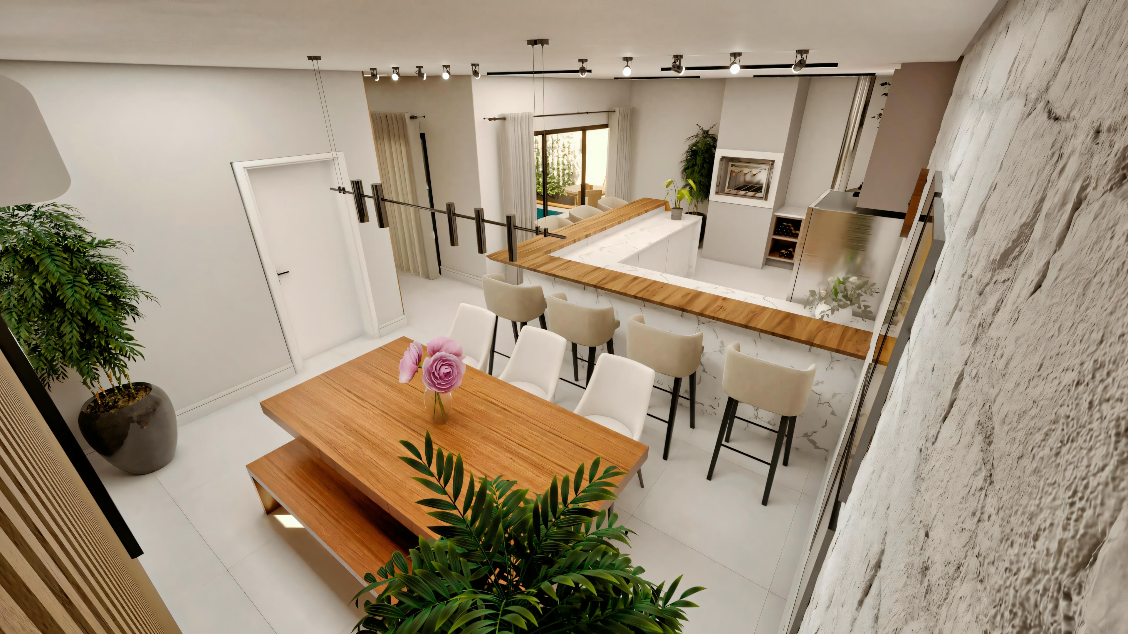 Cocina con espacio para comidas, gabinetes blancos, electrodomésticos de acero inoxidable, mesa de jantar de madera con sillas y luminarias colgantes arriba de la mesa.