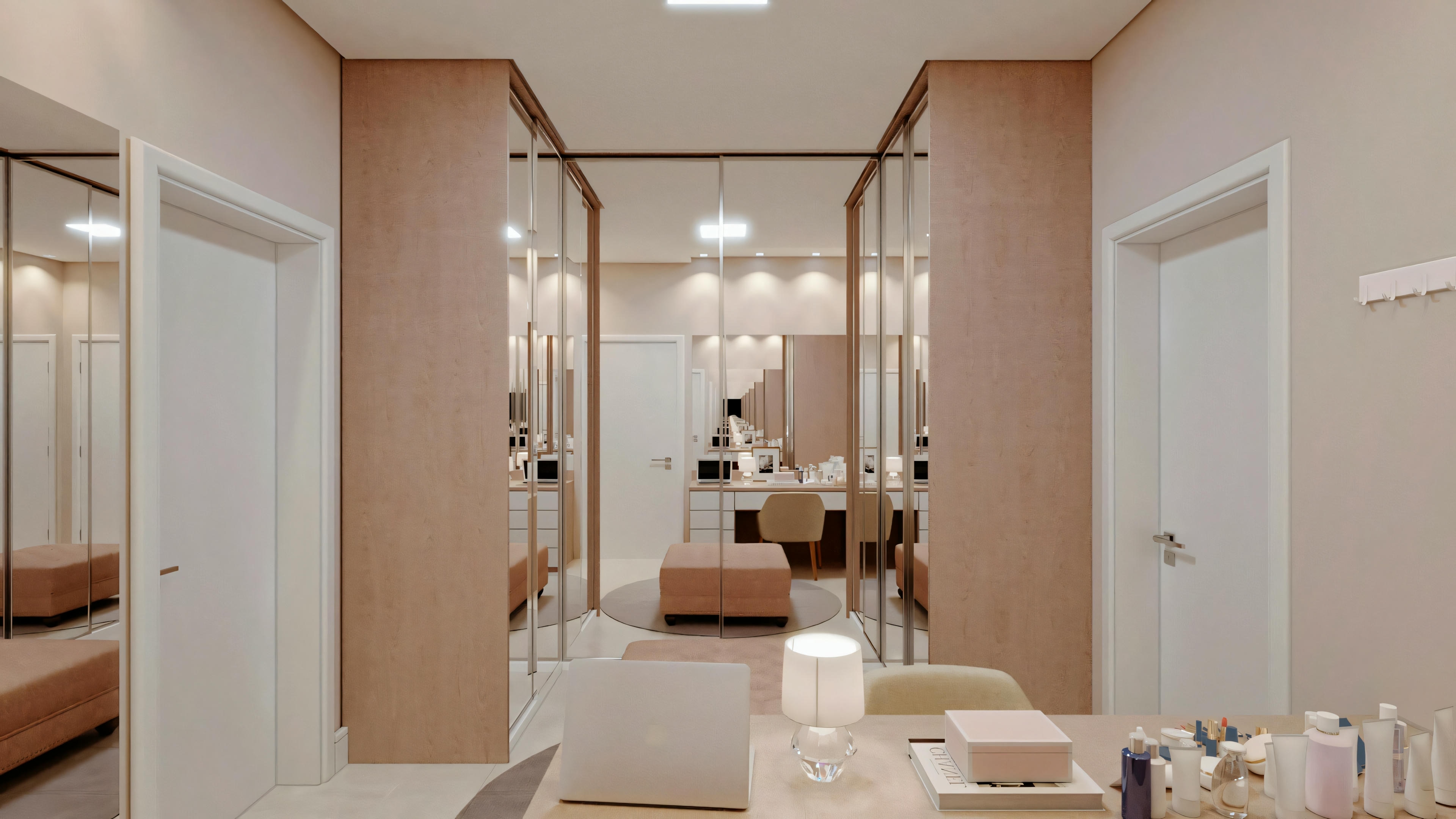 A modern bathroom with double sinks, mirrors, and a shower area in the background.
