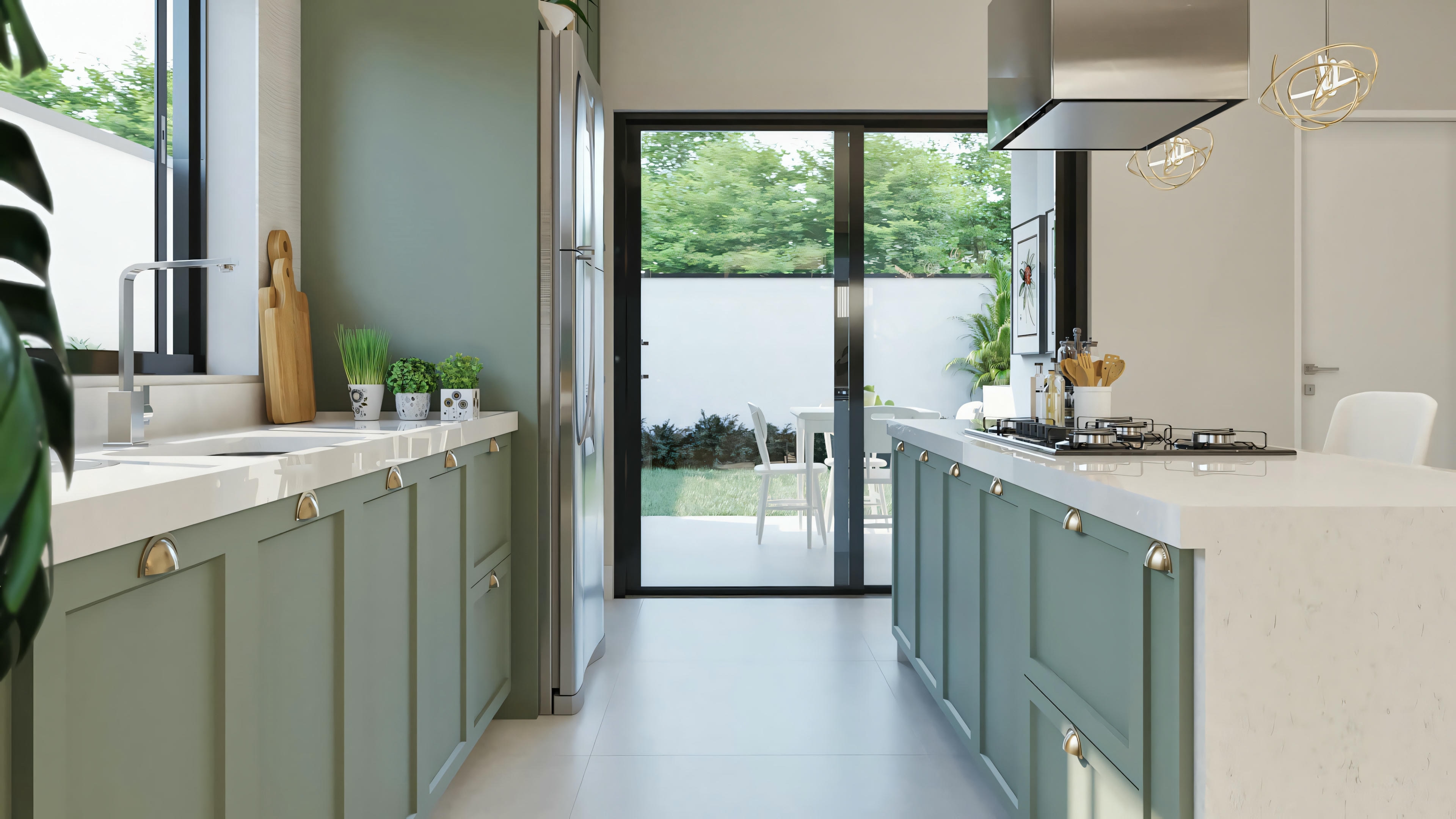 Kitchen with modern appliances, green cabinets, and a window allowing natural light.