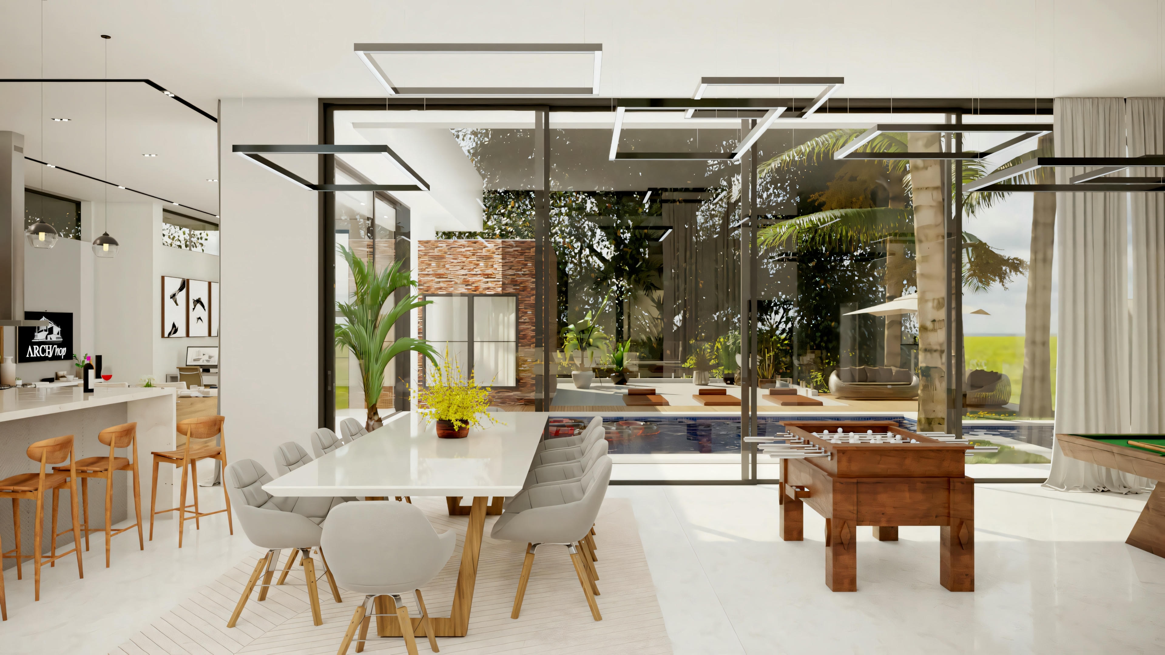 Interior space with a dining area, table and chairs, open kitchen with bar stools at the counter, and large windows.