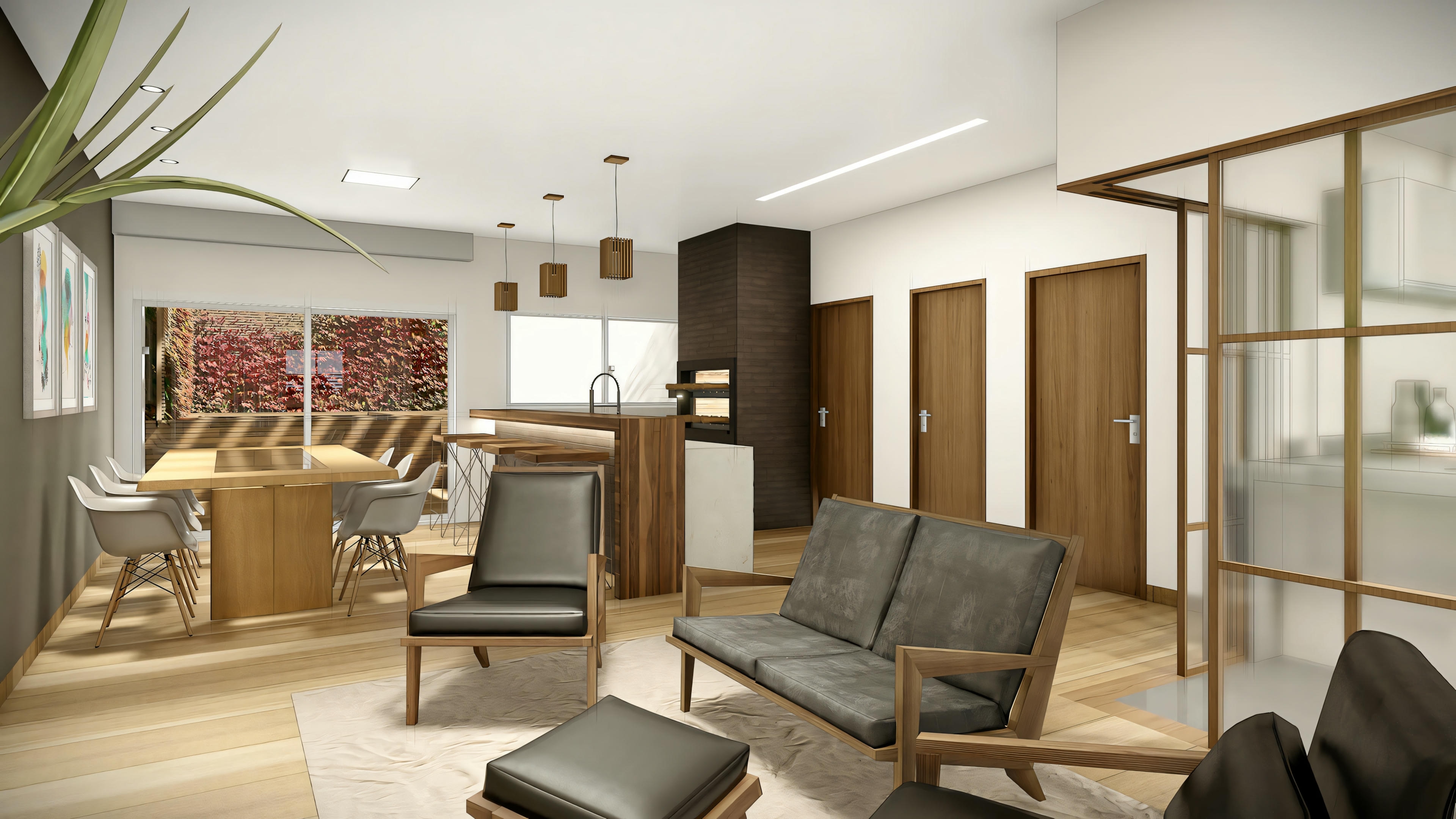A living room with beige furniture and art on the walls.