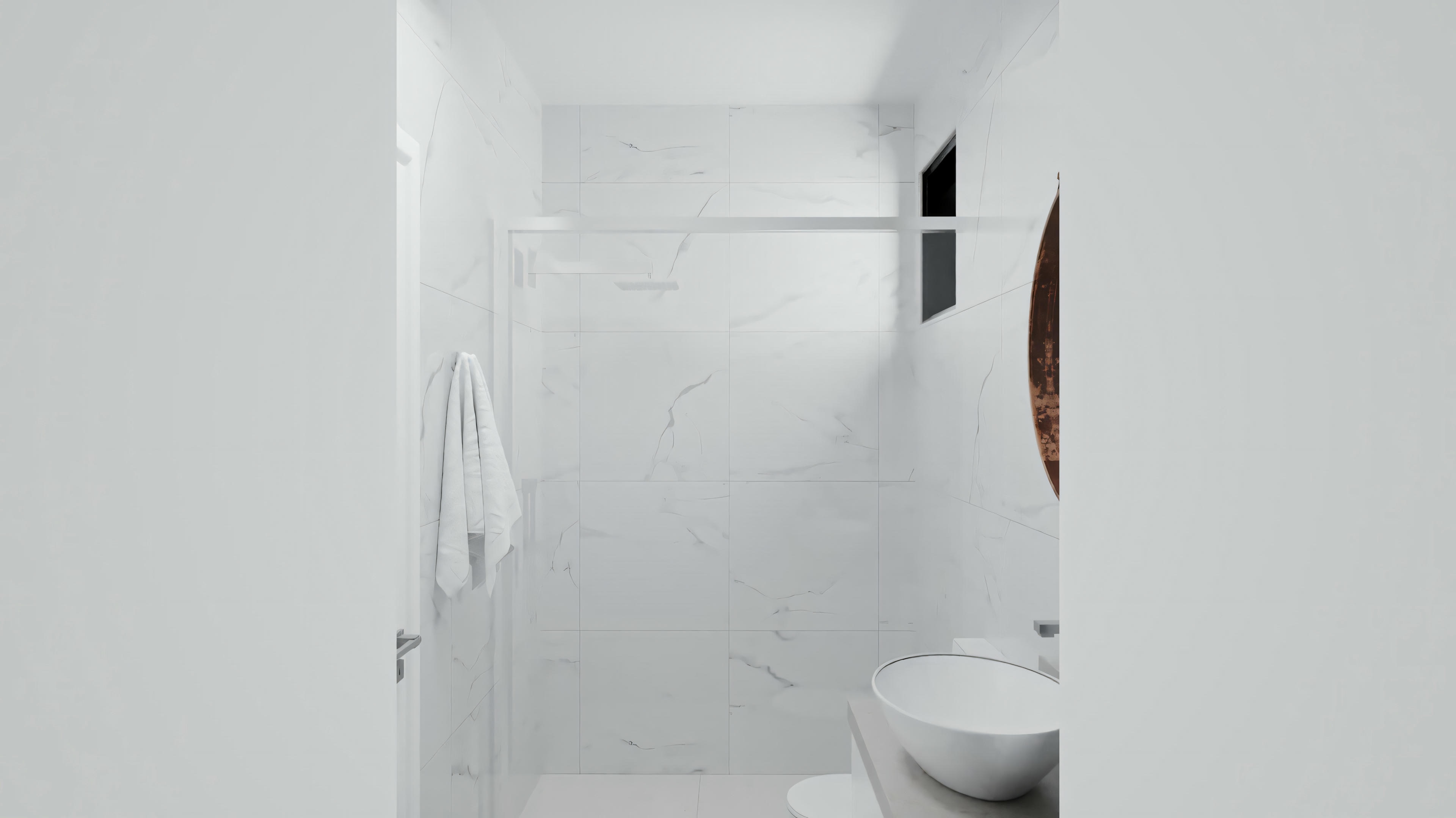 A white bathroom with a toilet and a towel hanging on the wall.
