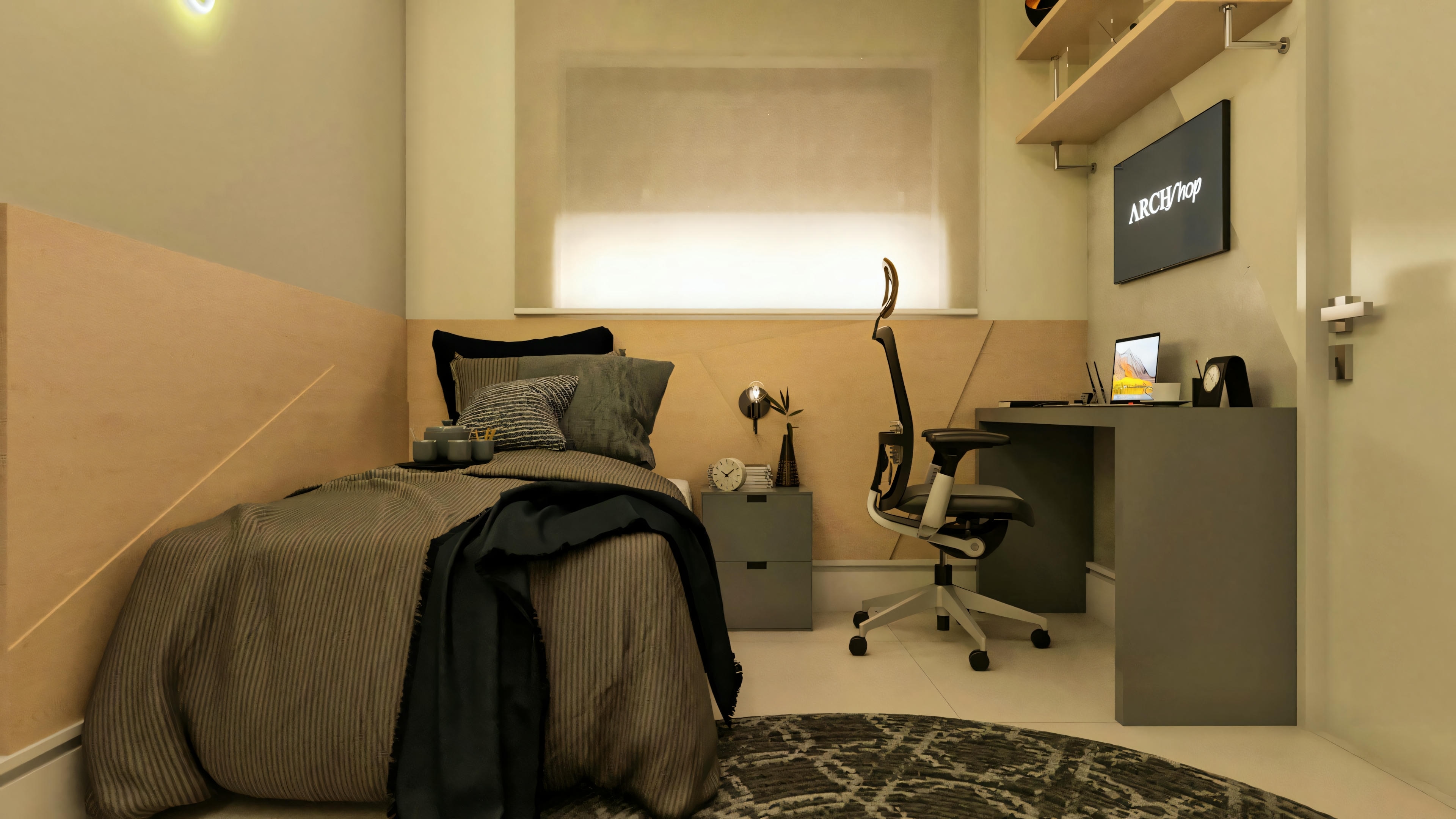 Suite bedroom of the 3-bedroom ranch house, furnished with a single bed, decorative wall panel, round rug, gray study/work desk integrated with a shelf, and TV on the wall.