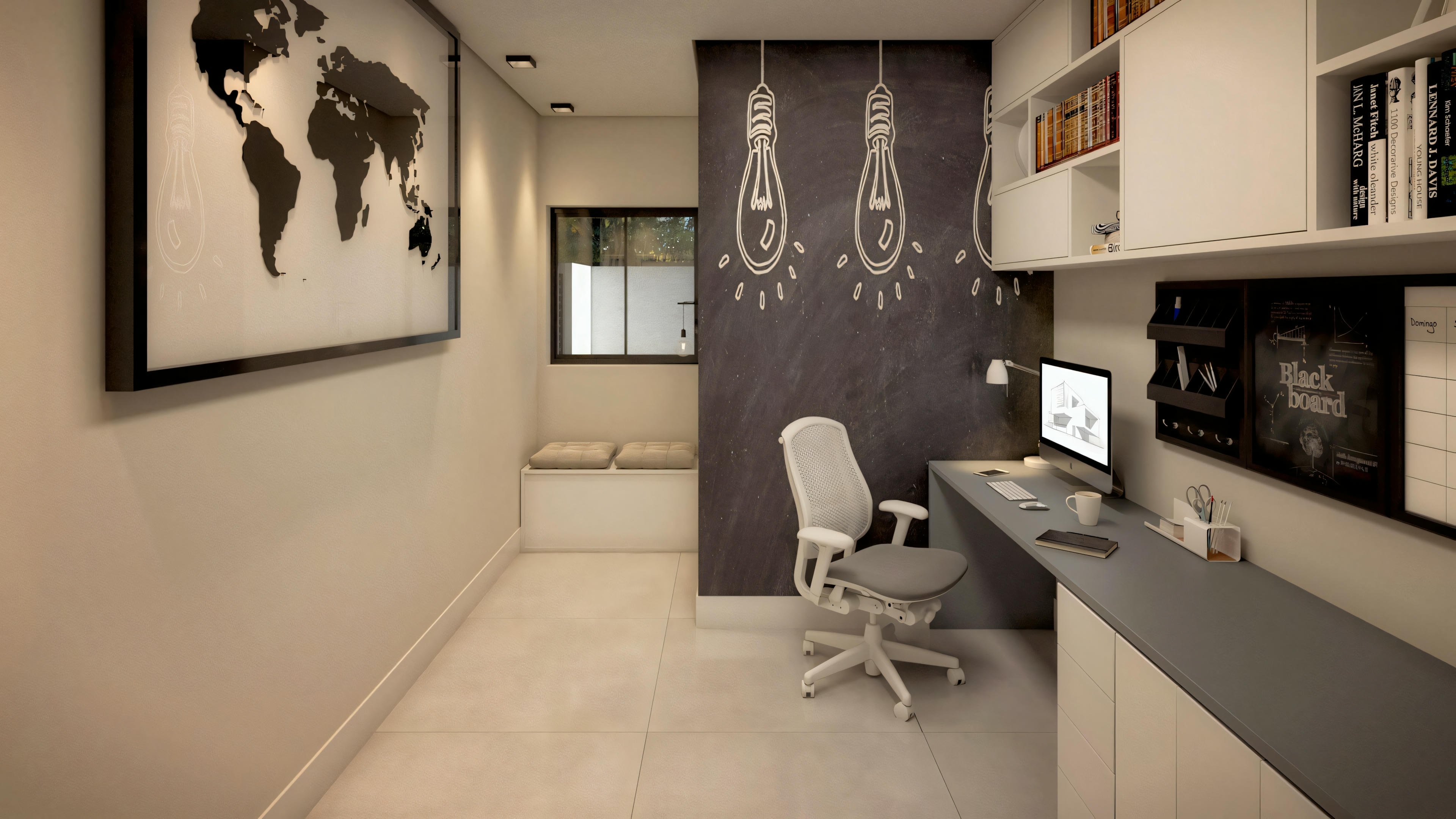 A modern office with a desk and computer, shelves with books, wall decoration, and recessed ceiling lighting.