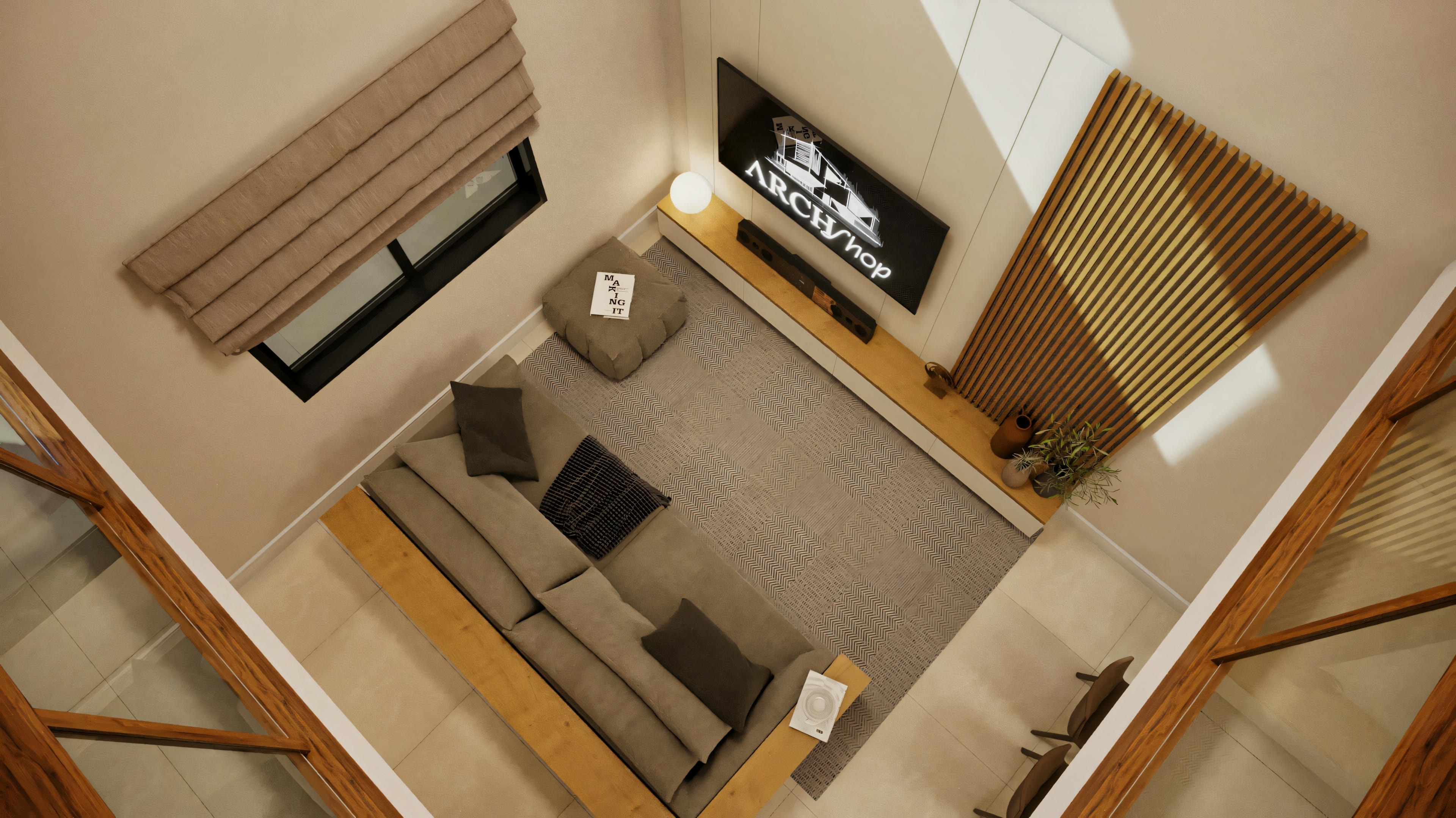 A living room viewed from above, with a sofa, table, and television.
