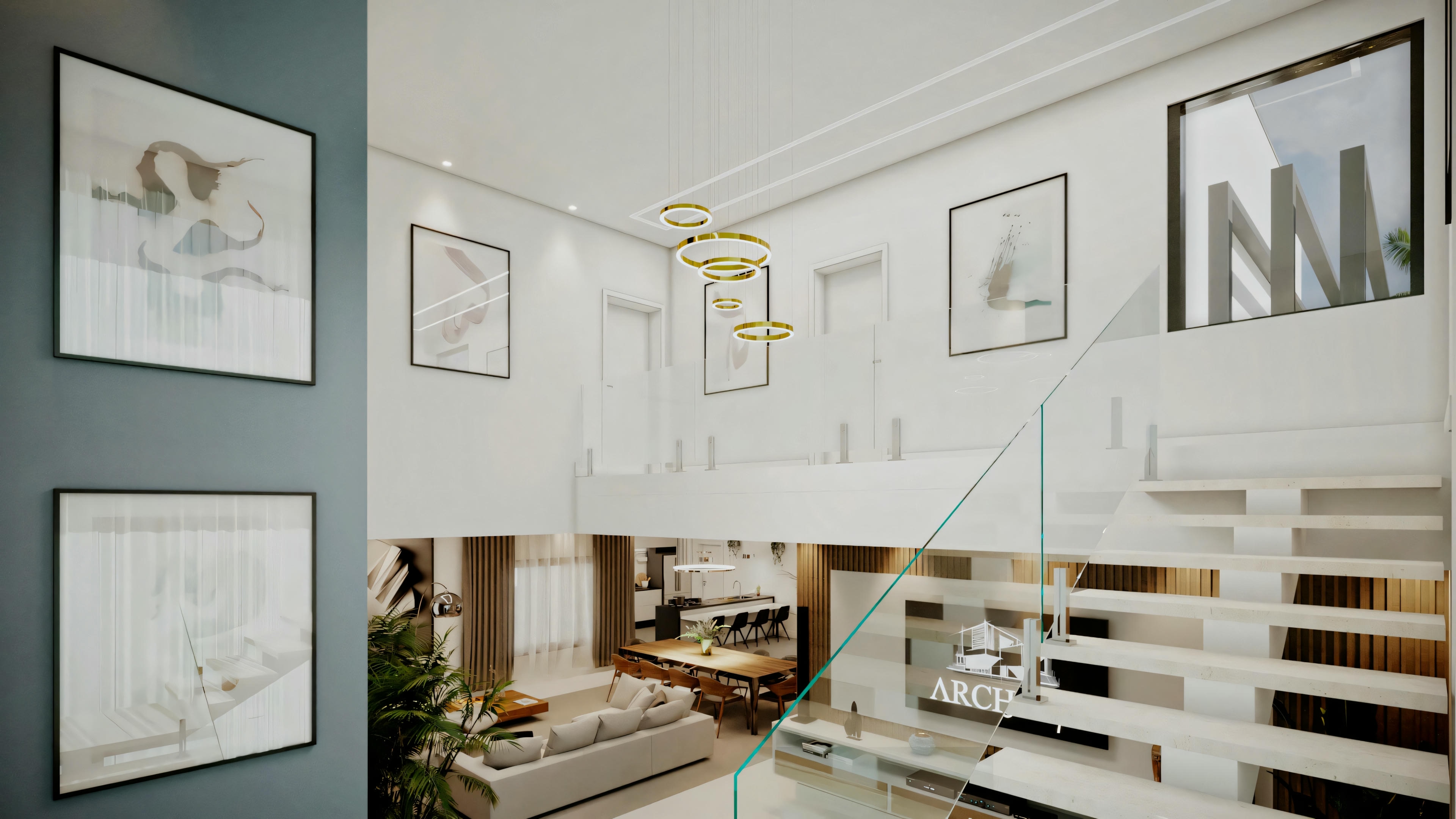 Pasillo o sala iluminada con cuadros enmarcados en la pared, un banco decorativo y detalles de barandilla que sugieren un nivel superior o escalera cercana.