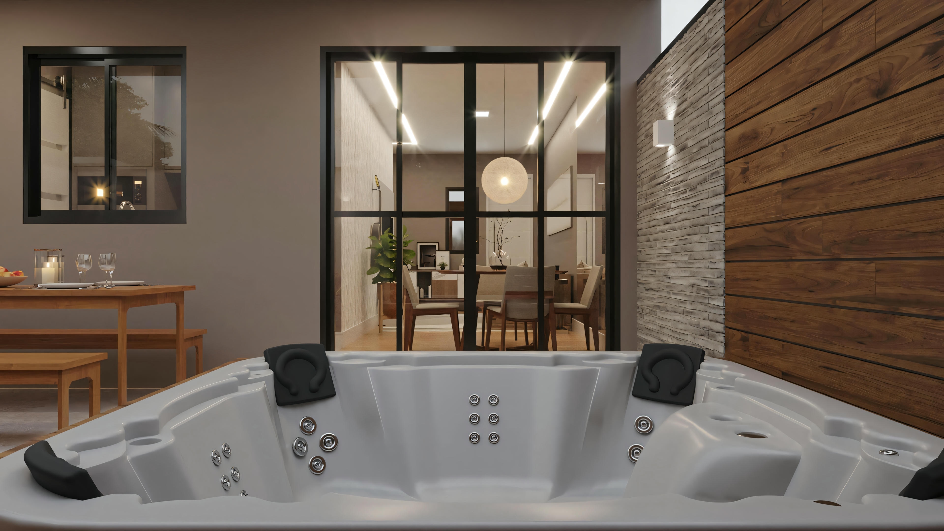 Um espaço interno com jacuzzi em primeiro plano e uma sala bem iluminada ao fundo, com móveis modernos e grandes janelas.