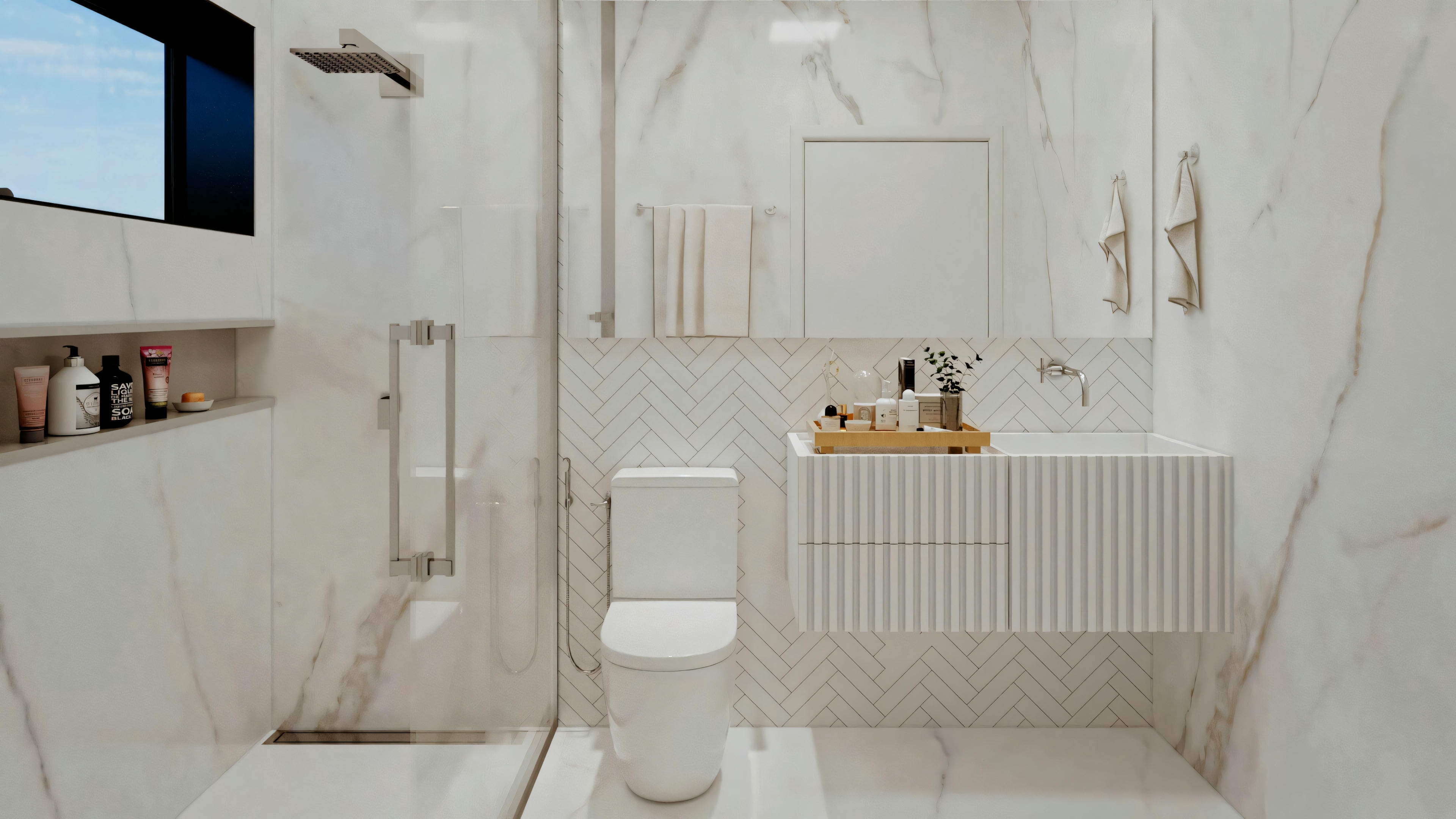 Un baño moderno con zona de ducha, váter y lavabo con objetos encima.