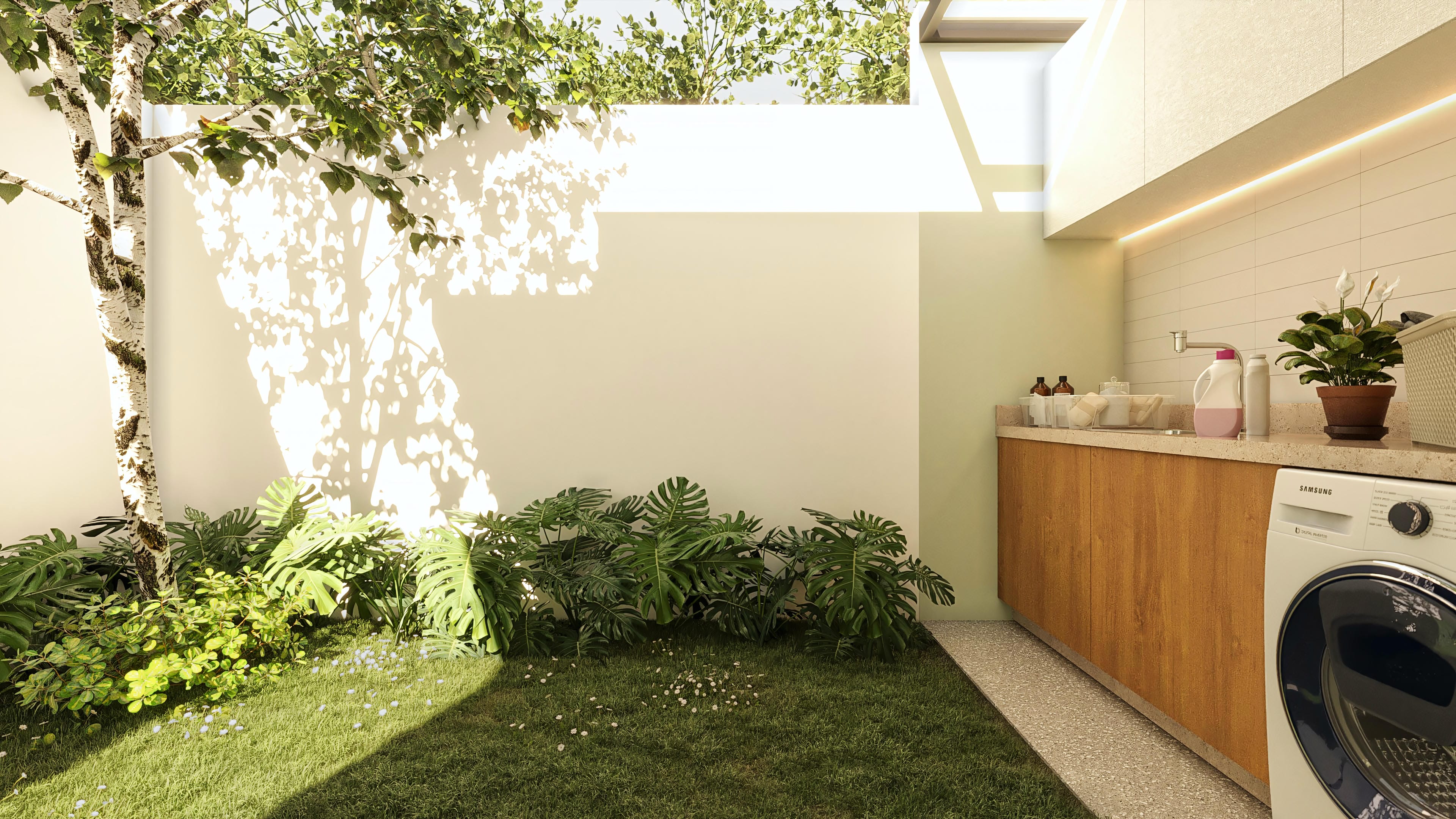 Laundry area with textured floor, wooden counter, sink, and washing machine, integrated into a garden with lush landscaping and natural lighting.
