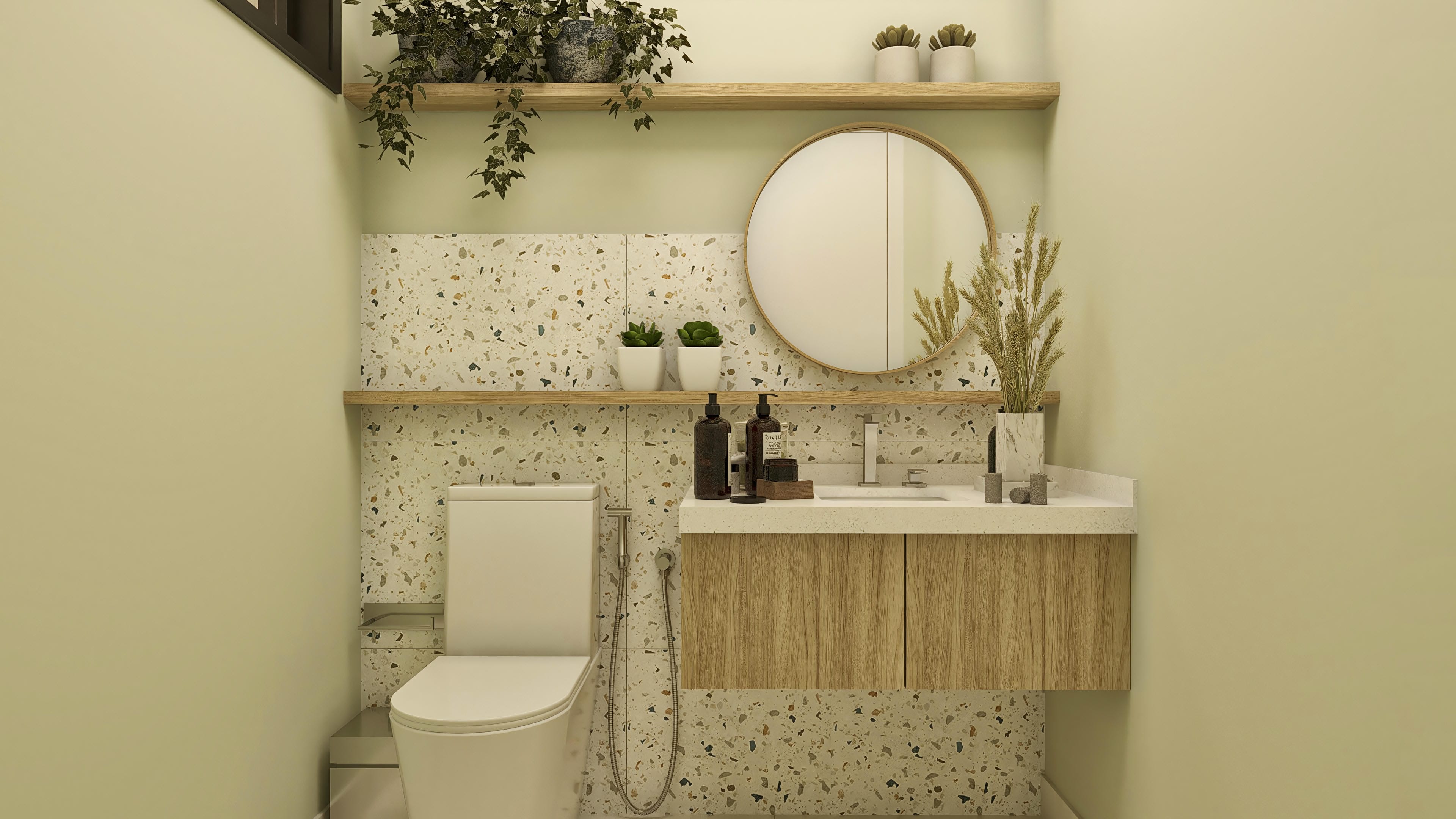 Bathroom counter with a sink carved in quartz, suspended wooden cabinet, round mirror with frame, and terrazzo tile cladding.