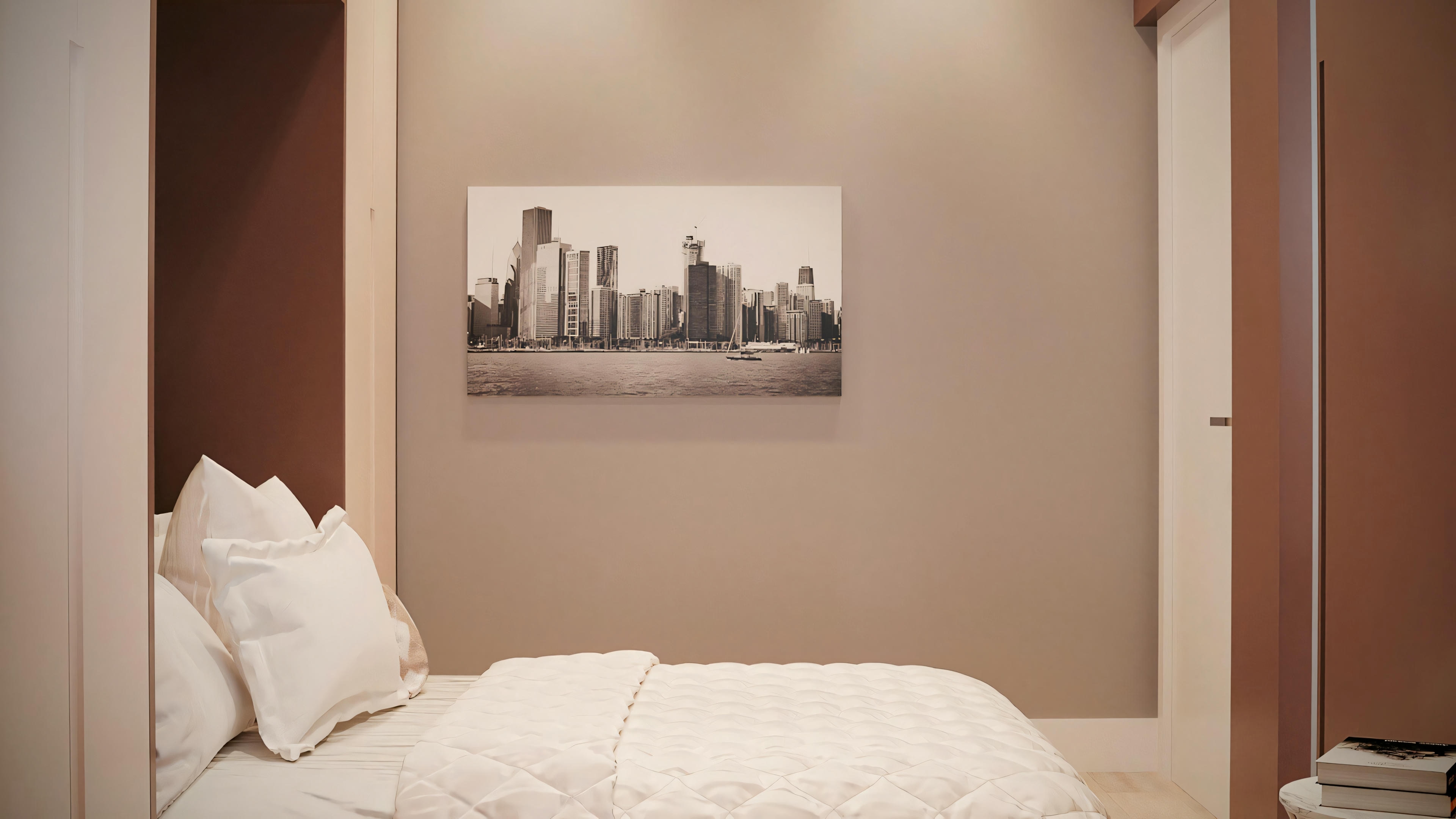 Um quarto com uma cama e uma mesa lateral.