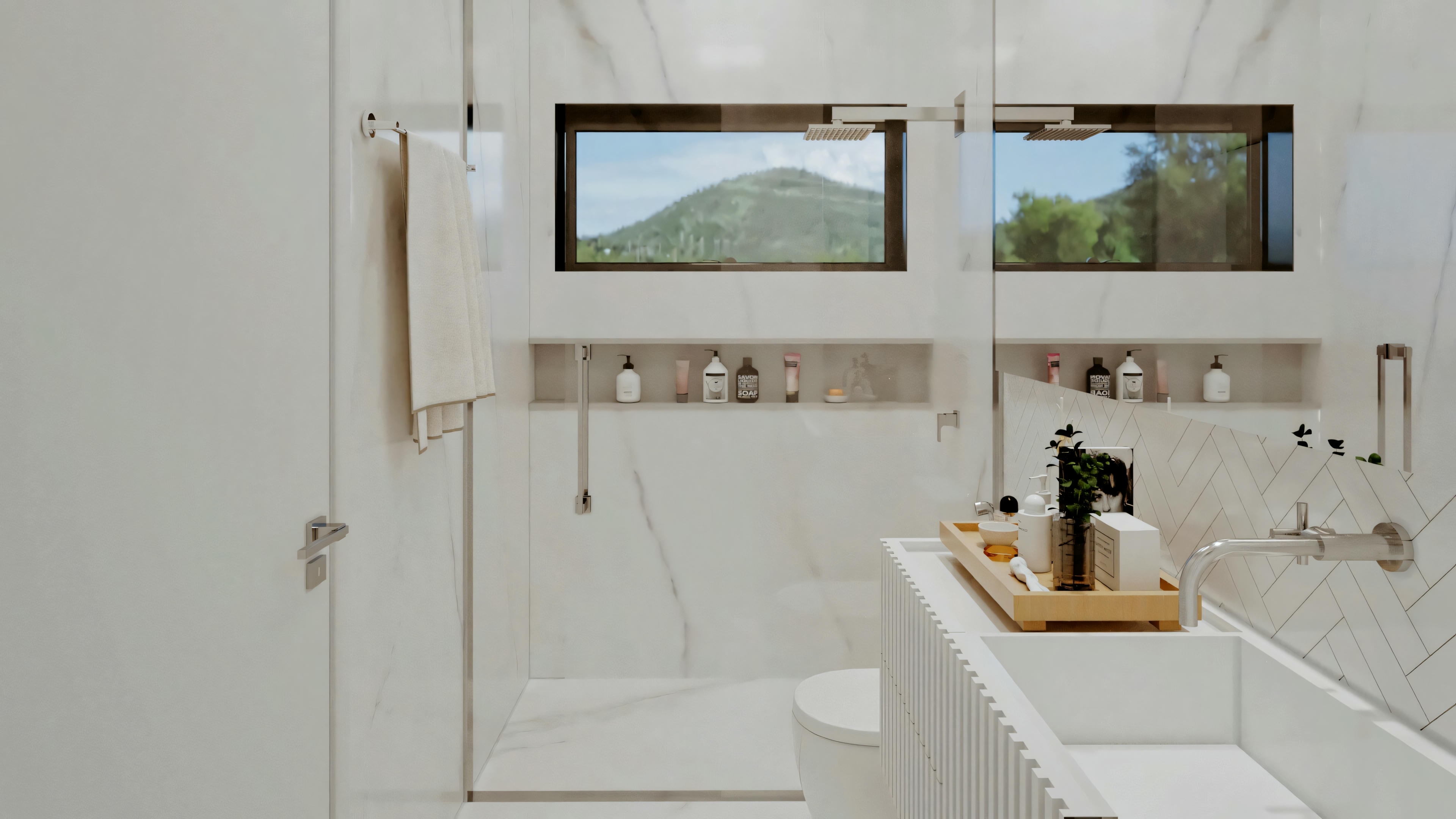 Un baño con una ventana que ofrece vistas a la vegetación exterior, incluyendo una bañera y un lavabo.