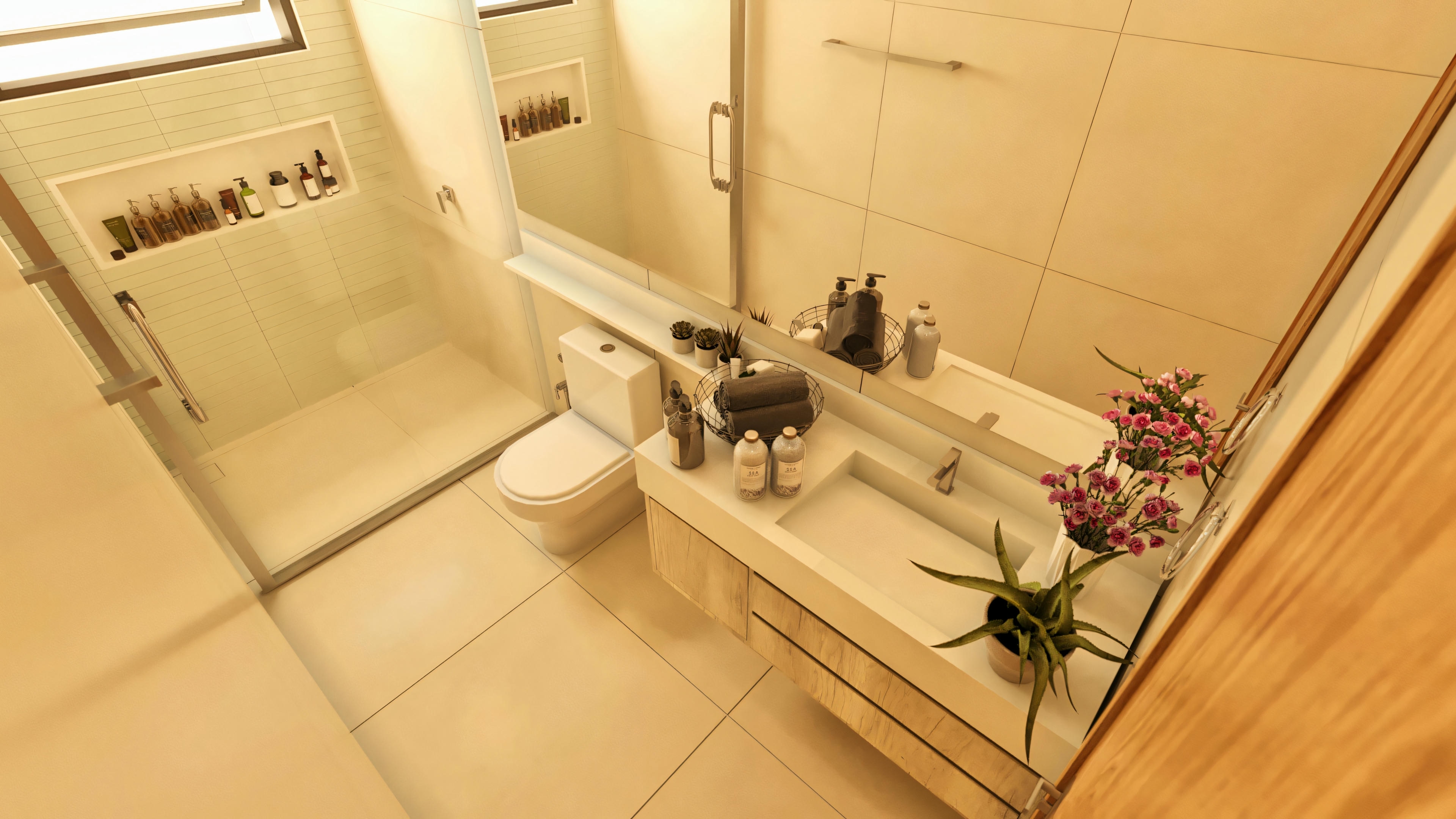 Top view of the suite bathroom in a modern 3-bedroom, 2-suite house, showing shower enclosure with built-in niches, toilet, light wood countertop with vessel sink, and mirror. The environment is clad in light porcelain tile and has natural lighting through a tall window.