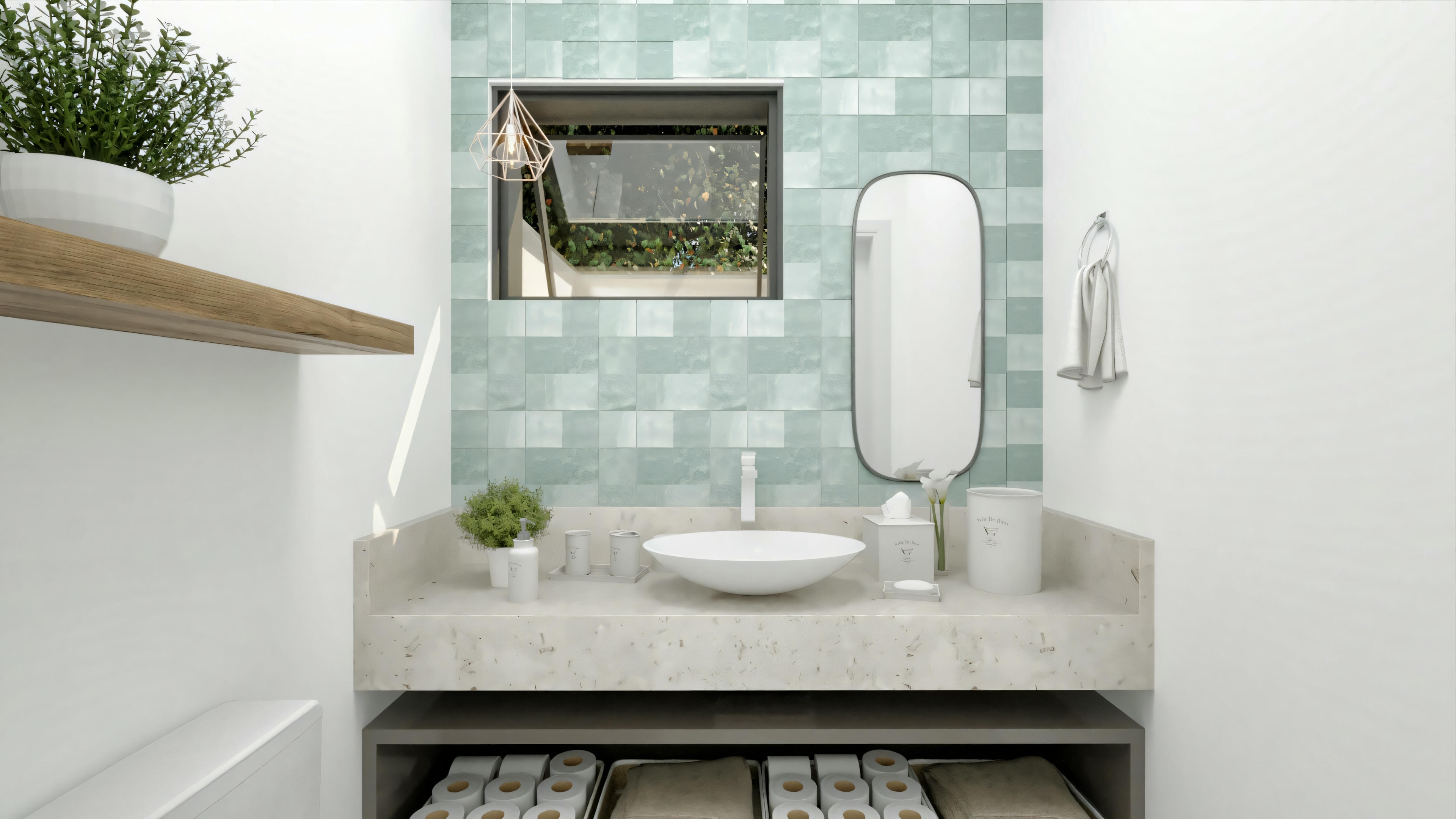 Un baño moderno con lavabo blanco, espejo y planta decorativa al lado.