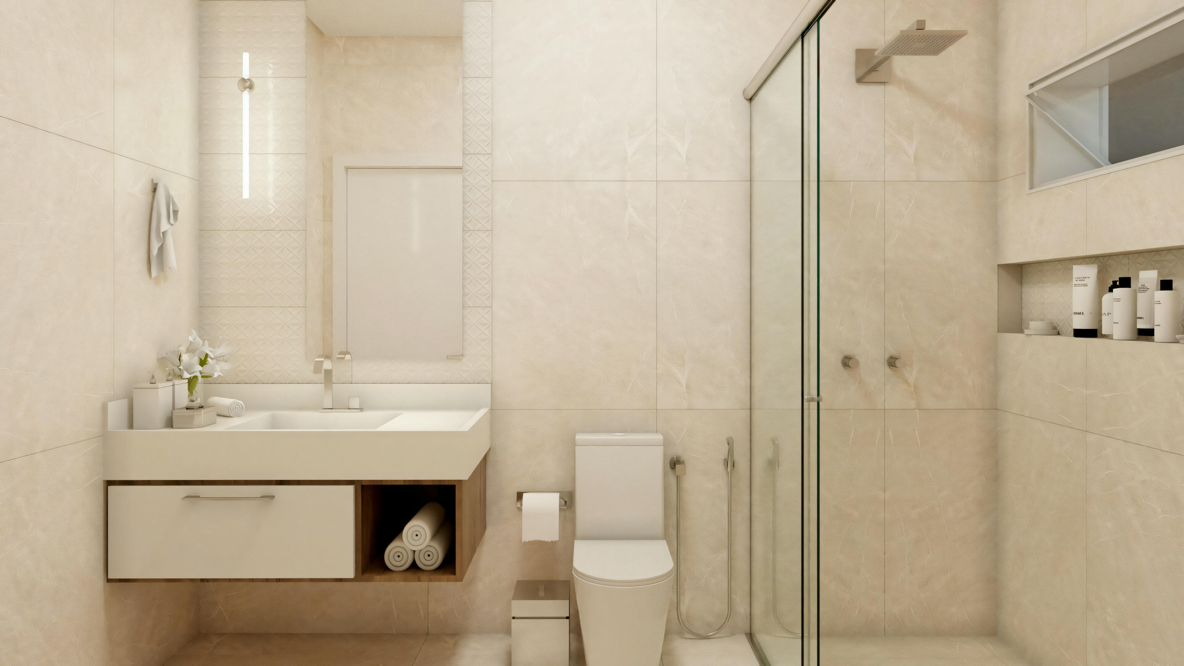 Un cuarto de baño con cabina de ducha de vidrio, lavabo y espejo.