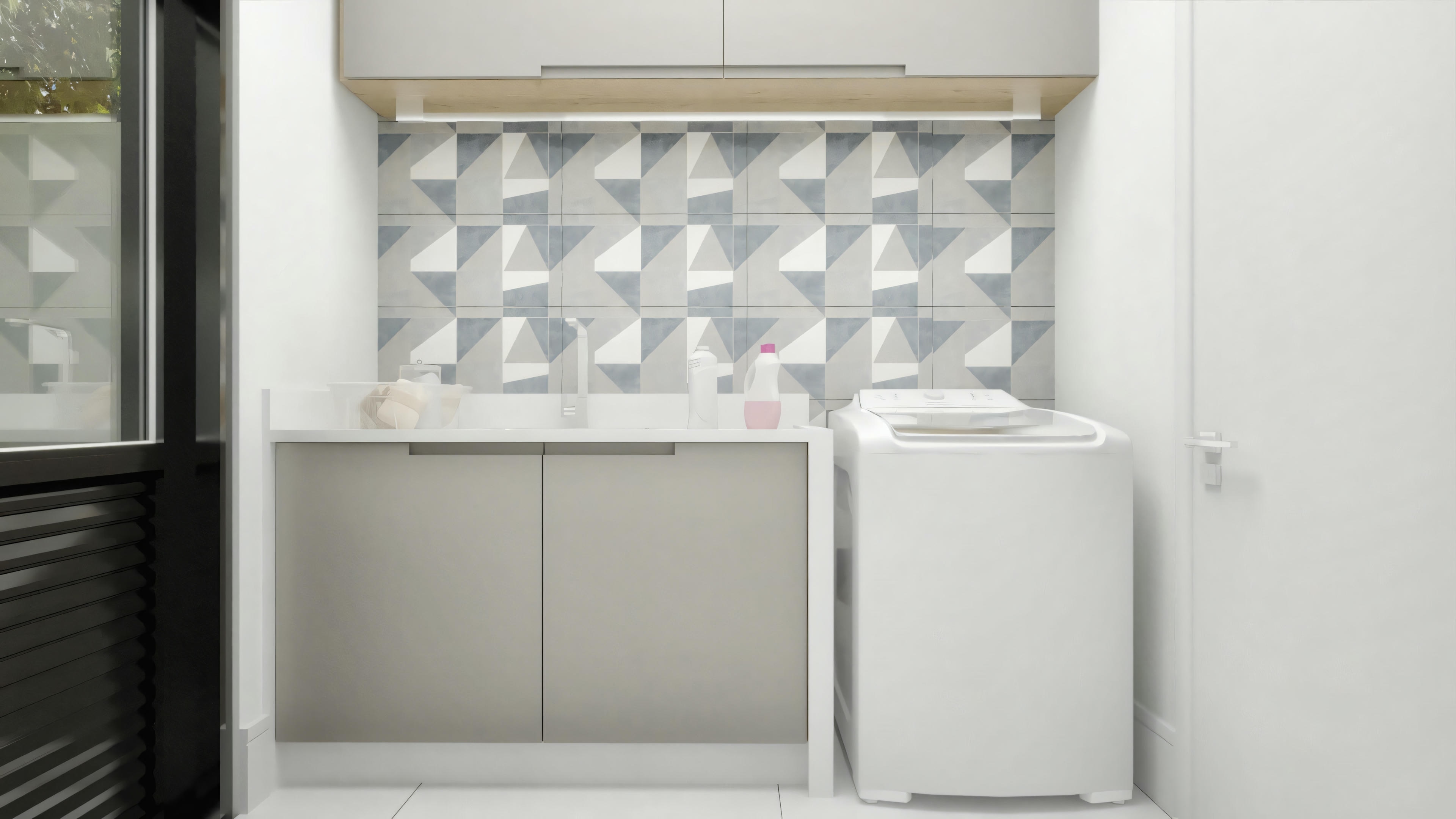 A modern laundry room with a washing machine, dryer, and a tile backsplash.