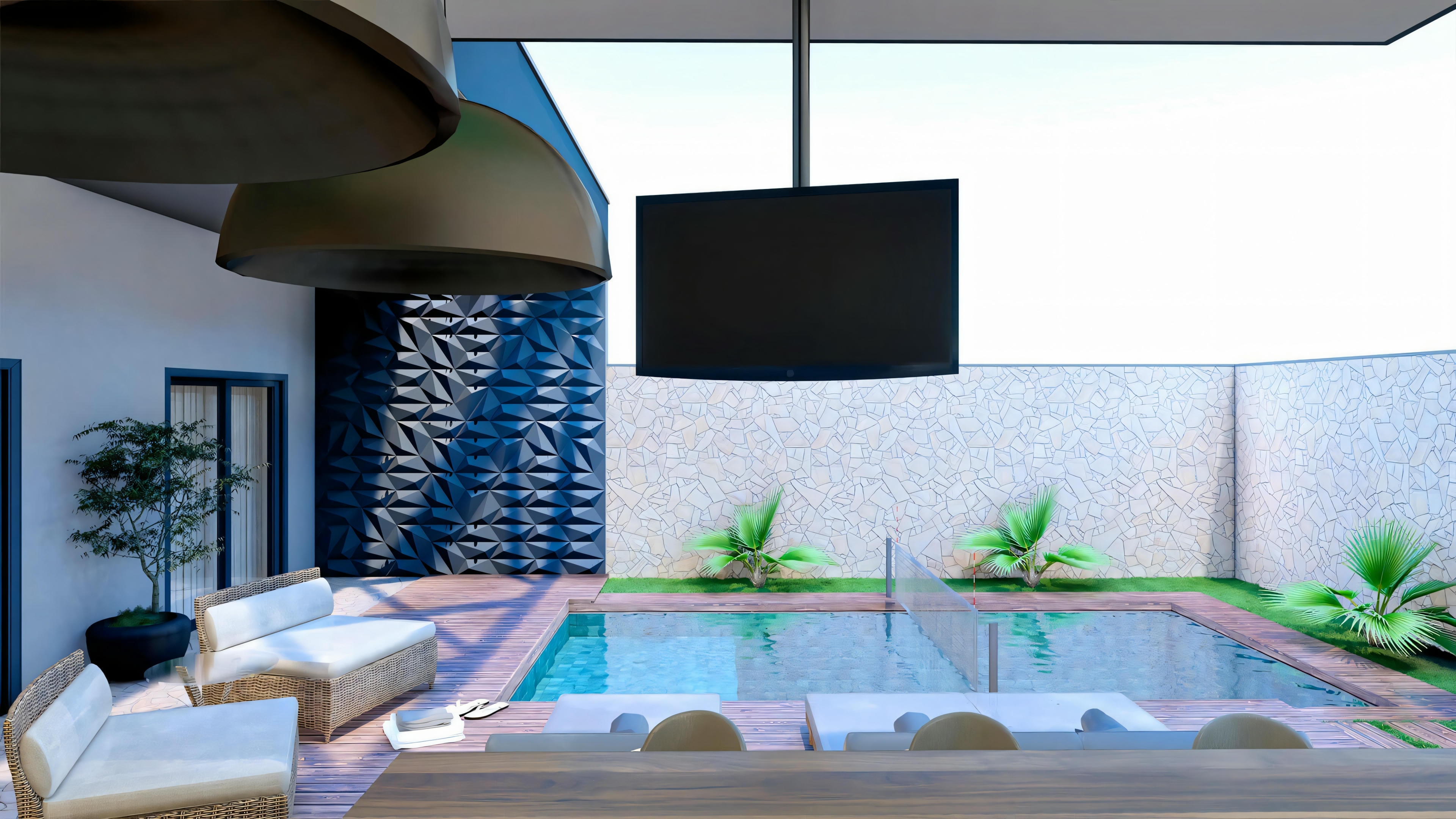 Una zona de estar exterior con una luminaria moderna colgante, sillas y una barrera de cristal con vistas a una masa de agua, posiblemente un lago decorativo o piscina.
