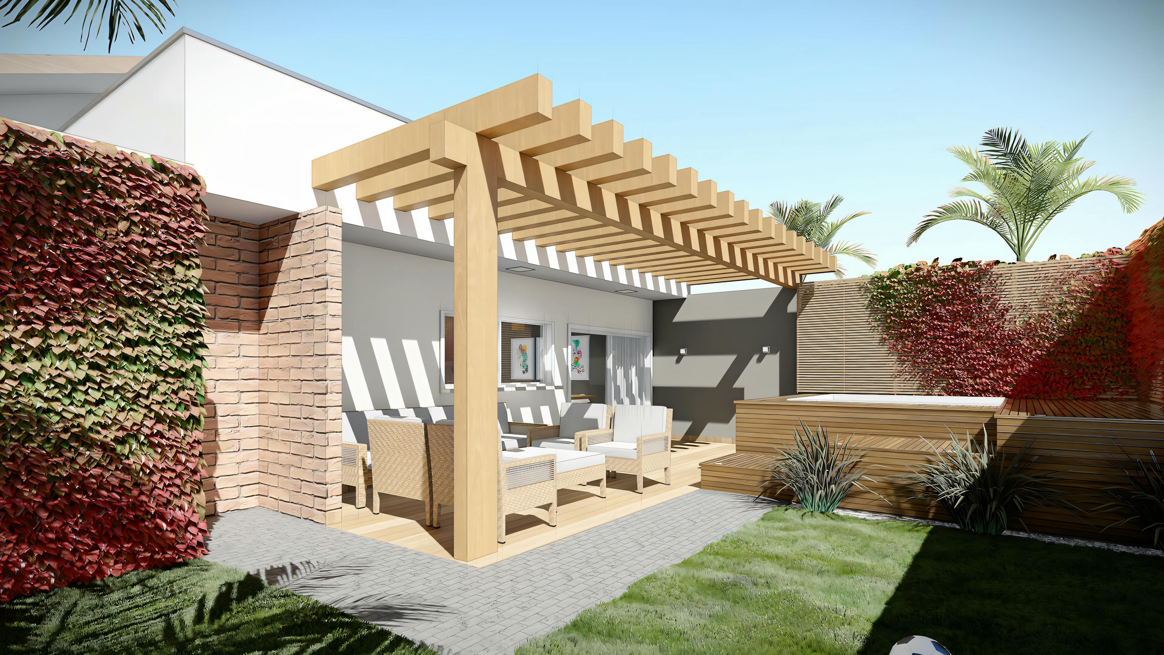 Uma casa com folhagem vermelha na parede frontal, grandes portas de vidro e área de estar externa.