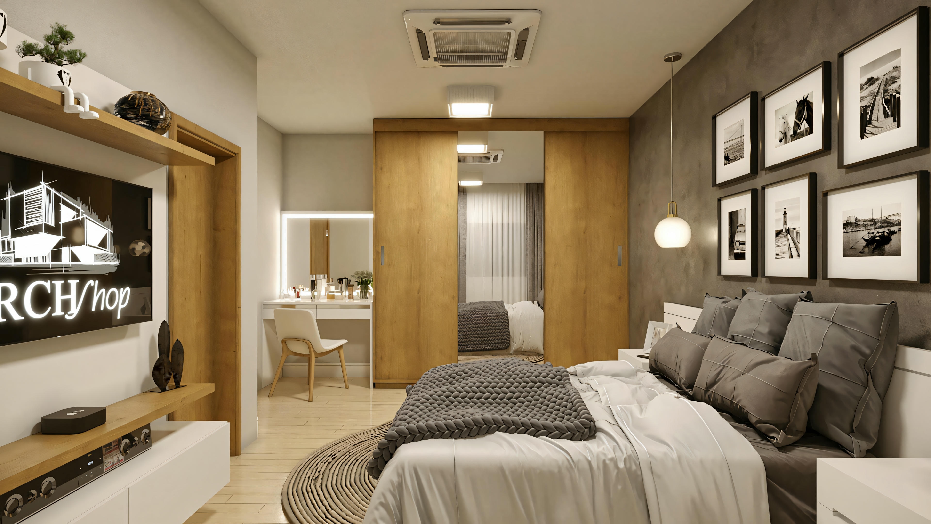 Un dormitorio con cama de matrimonio, estanterías con libros y cuadros enmarcados en la pared.
