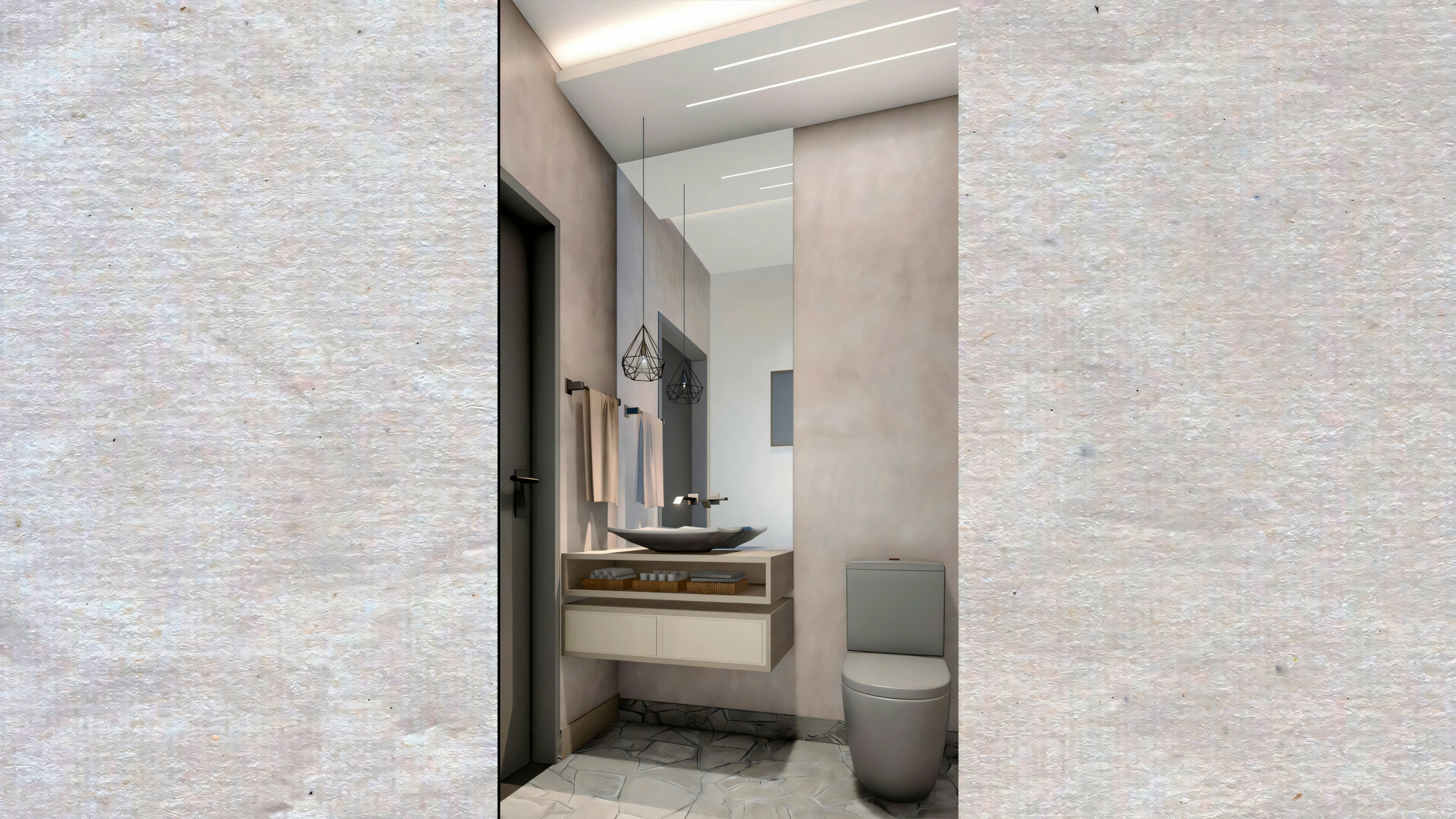 A modern bathroom with a sink and mirror, and to the right, a toilet. The walls are tiled and there is a towel hanging on the left side.