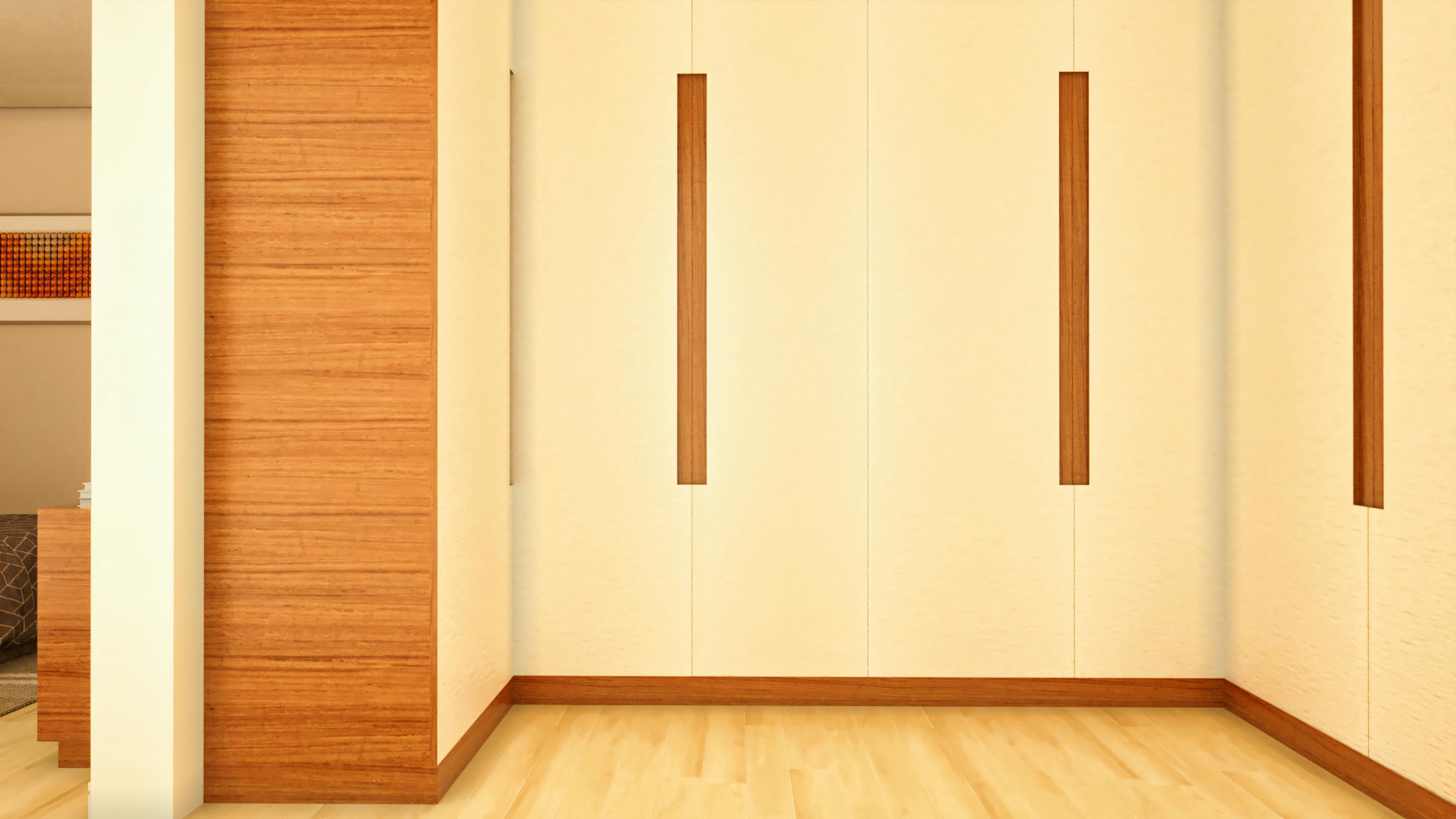 Detalhe do closet com armários planejados em uma das 5 suítes da casa de alto padrão, com acabamento em madeira clara e puxadores embutidos.