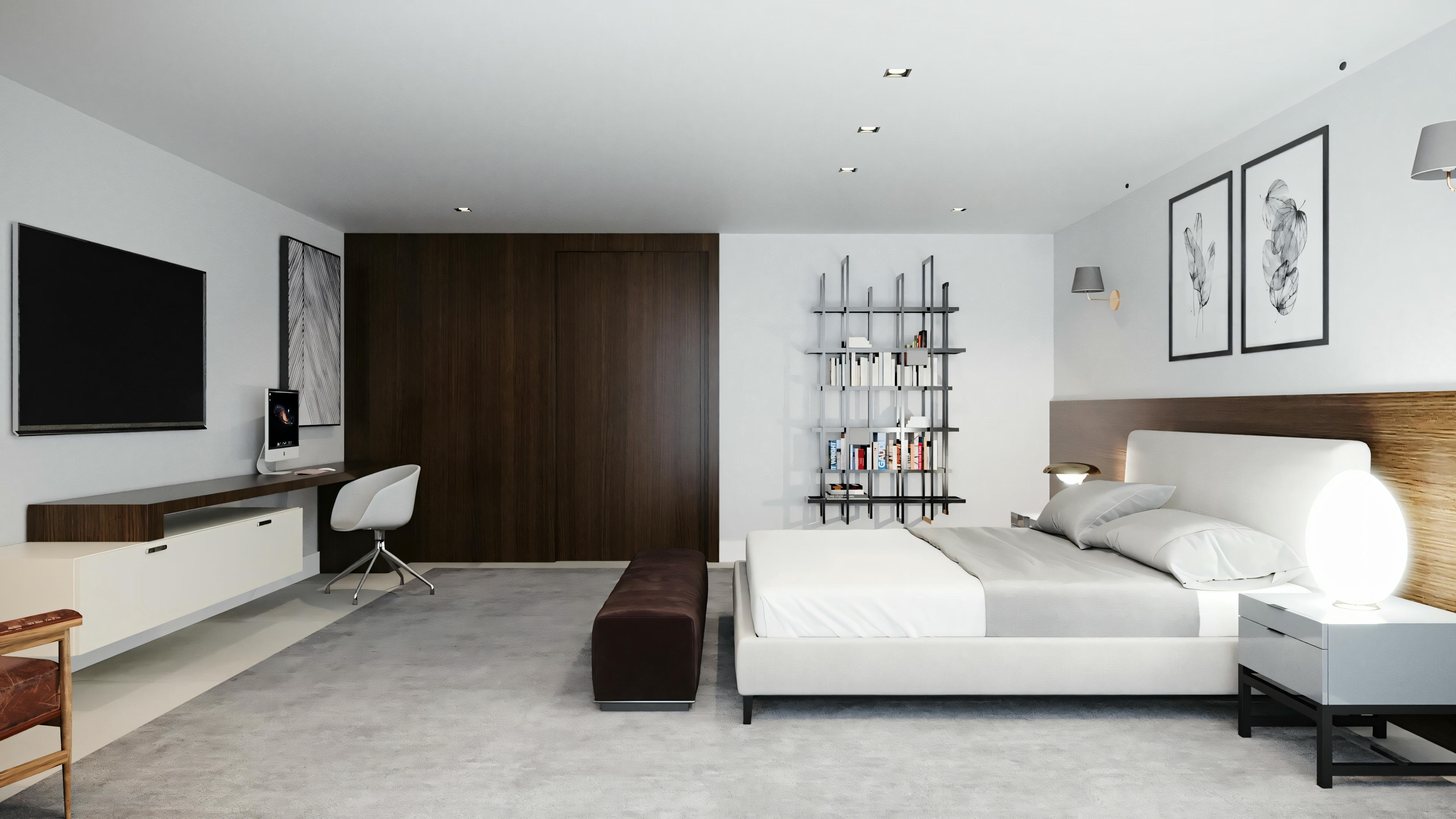 A bedroom with a large bed to the right, nightstands on both sides of the bed, and bookshelves on the opposite wall.