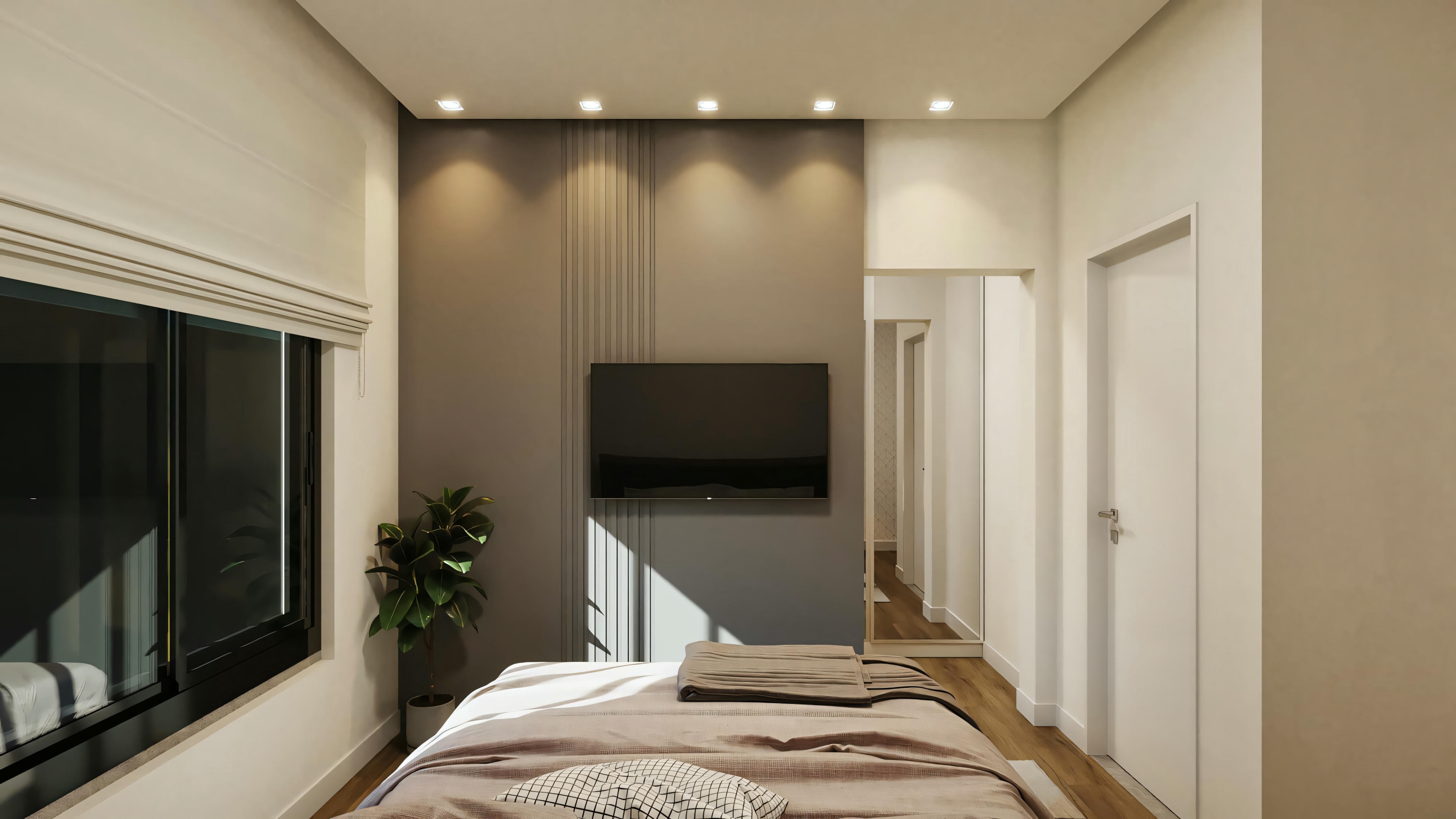Quarto moderno com cama grande, televisão de tela plana montada na parede e mesas de cabeceira.