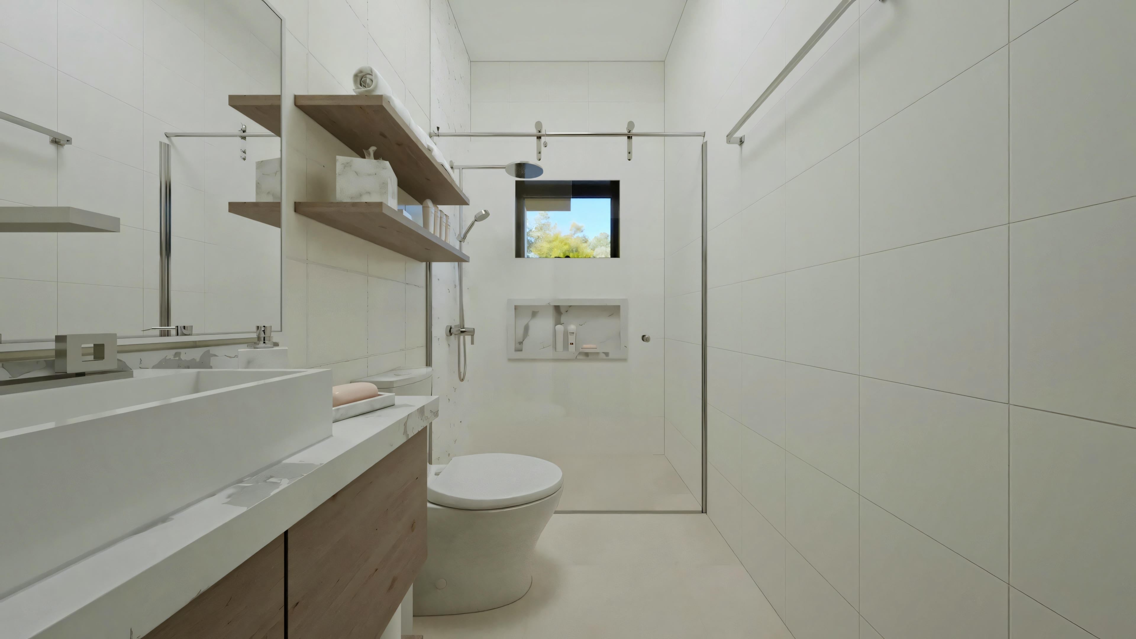 Un baño moderno con paredes y accesorios blancos, incluyendo lavabo, espejo, inodoro y área de ducha visible a través de una mampara de vidrio.