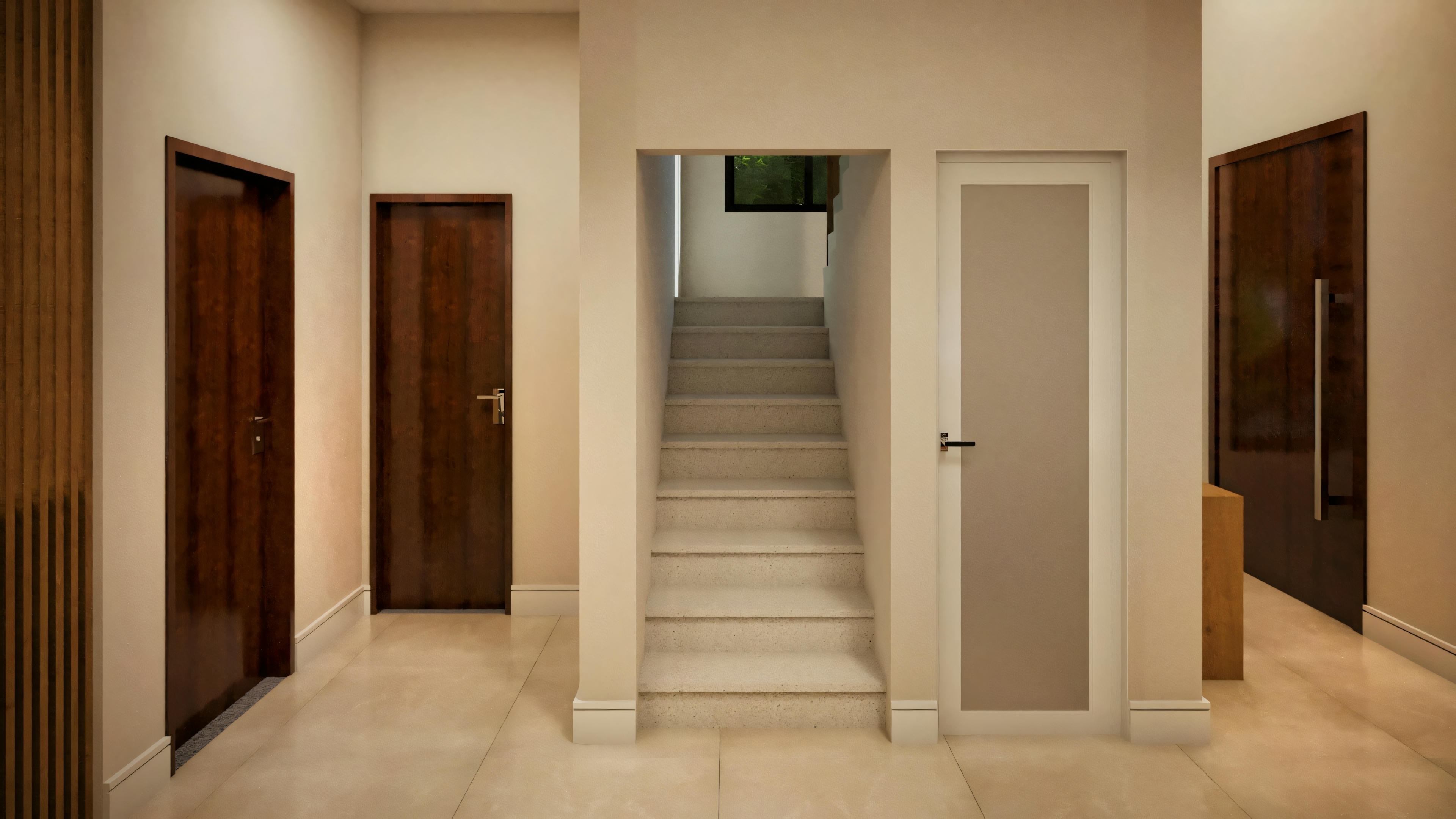 Pasillo interior que conduce a una escalera con paredes blancas y escalones de madera.