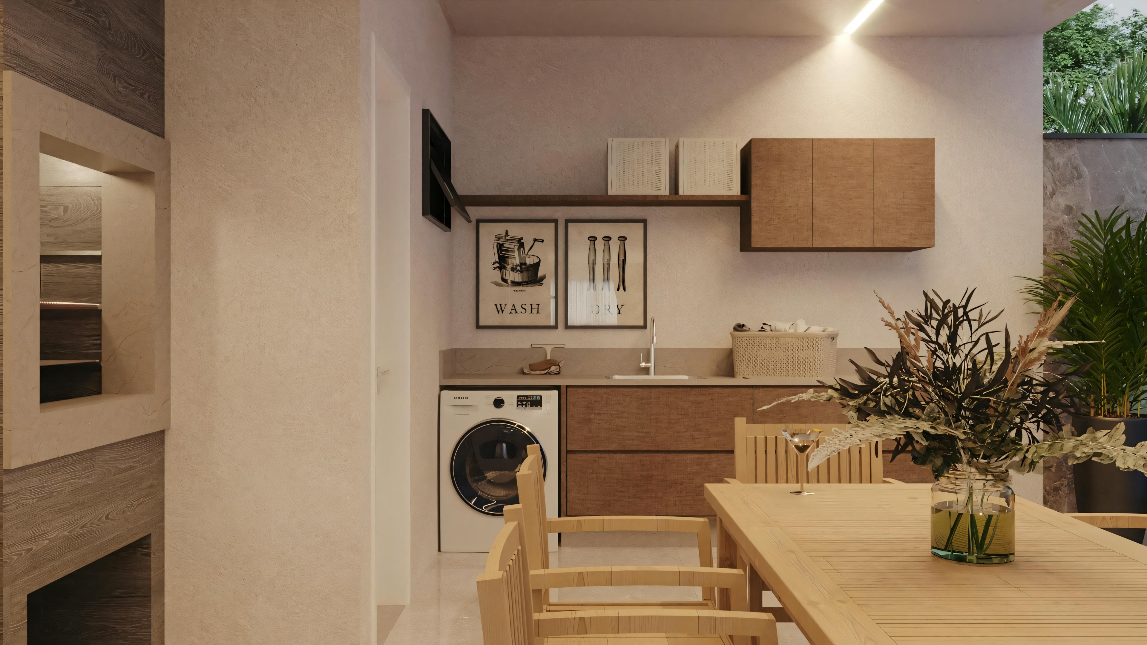 Una zona gourmet moderna con armarios de madera, encimera y un plano abierto que conduce a una zona de estar con sofá y mesa pequeña.
