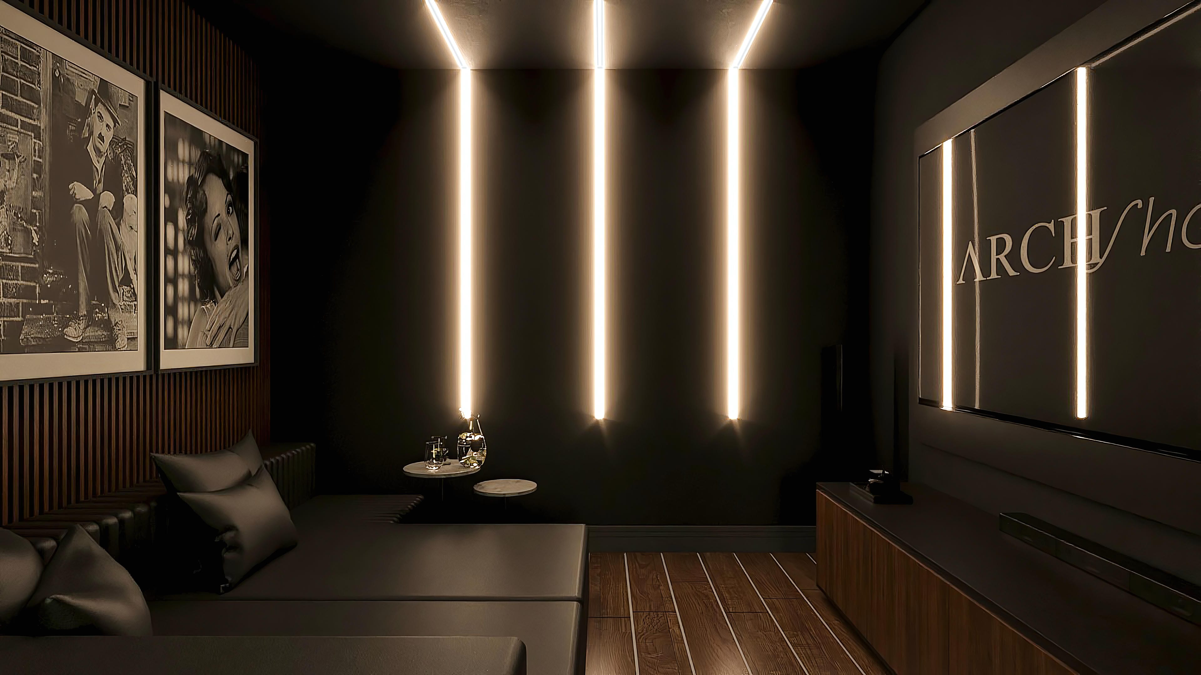 Detalhe interno de um sobrado neoclássico de alto padrão com iluminação linear em LED, obras de arte em preto e branco e marcenaria escura.