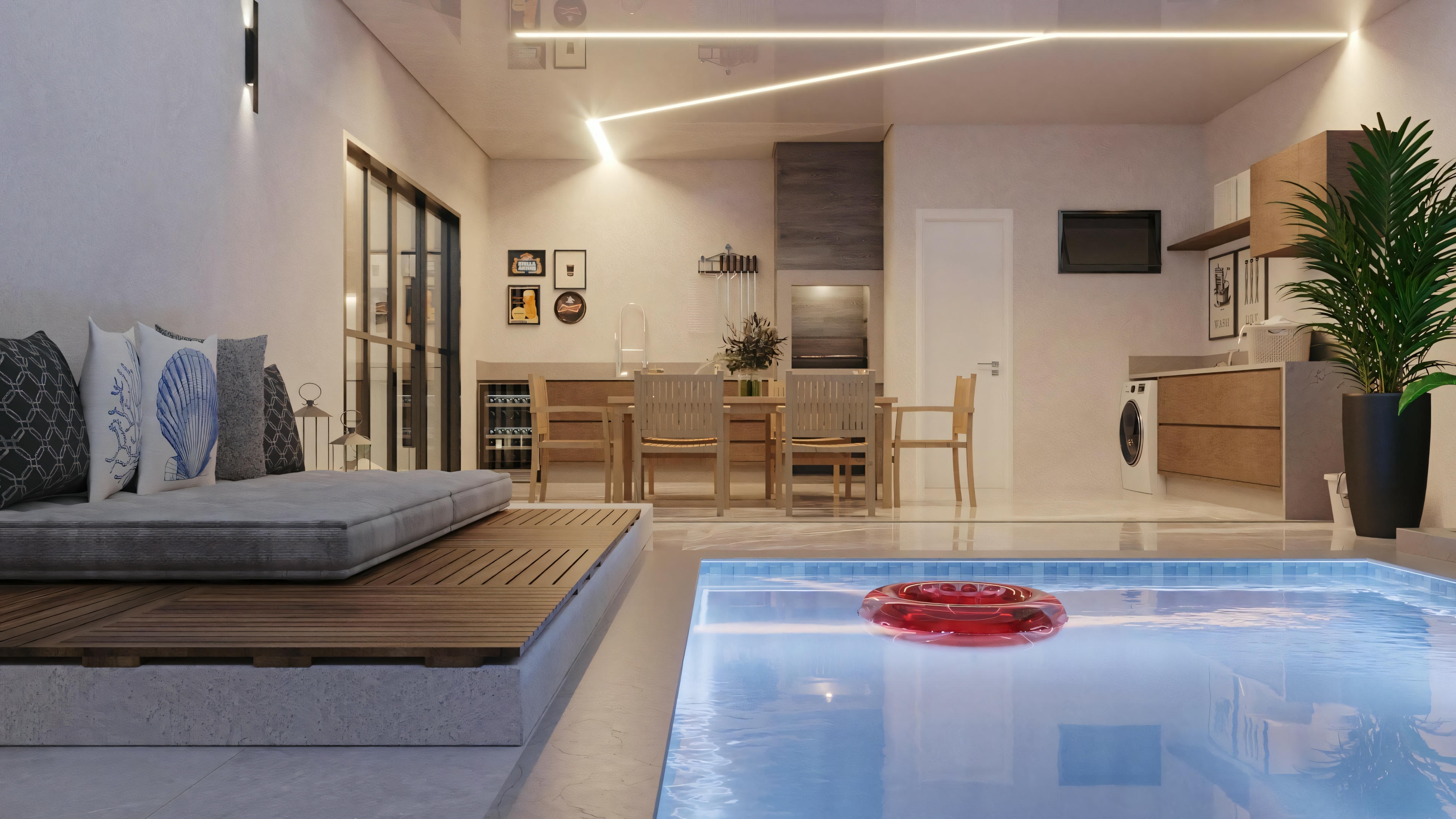 Una zona gourmet moderna con sofá, mesa de centro y piscina cubierta con flores rojas flotando.