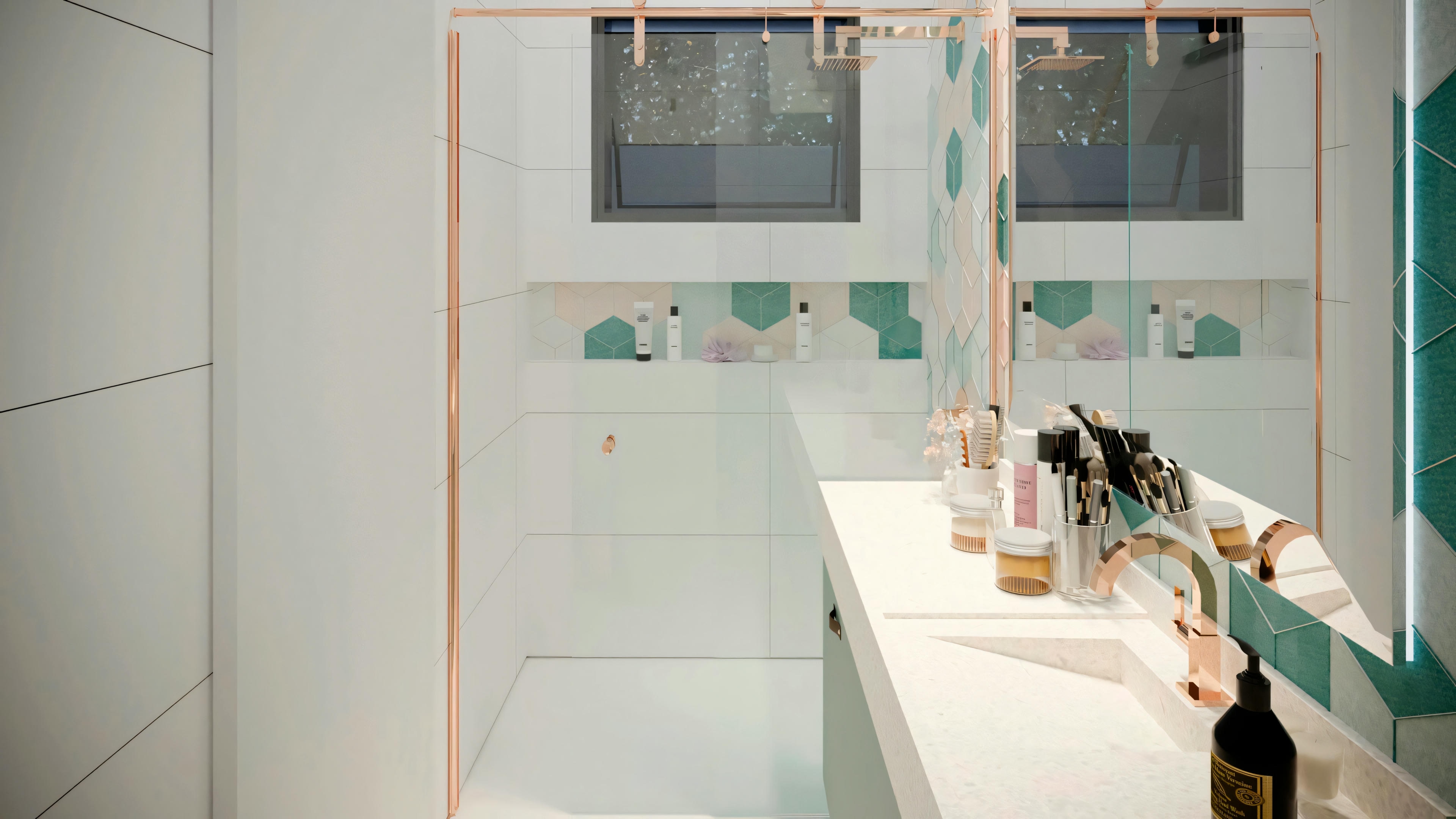 Un baño moderno con un espejo largo, lavabos dobles y detalles en verde azulado en la pared.