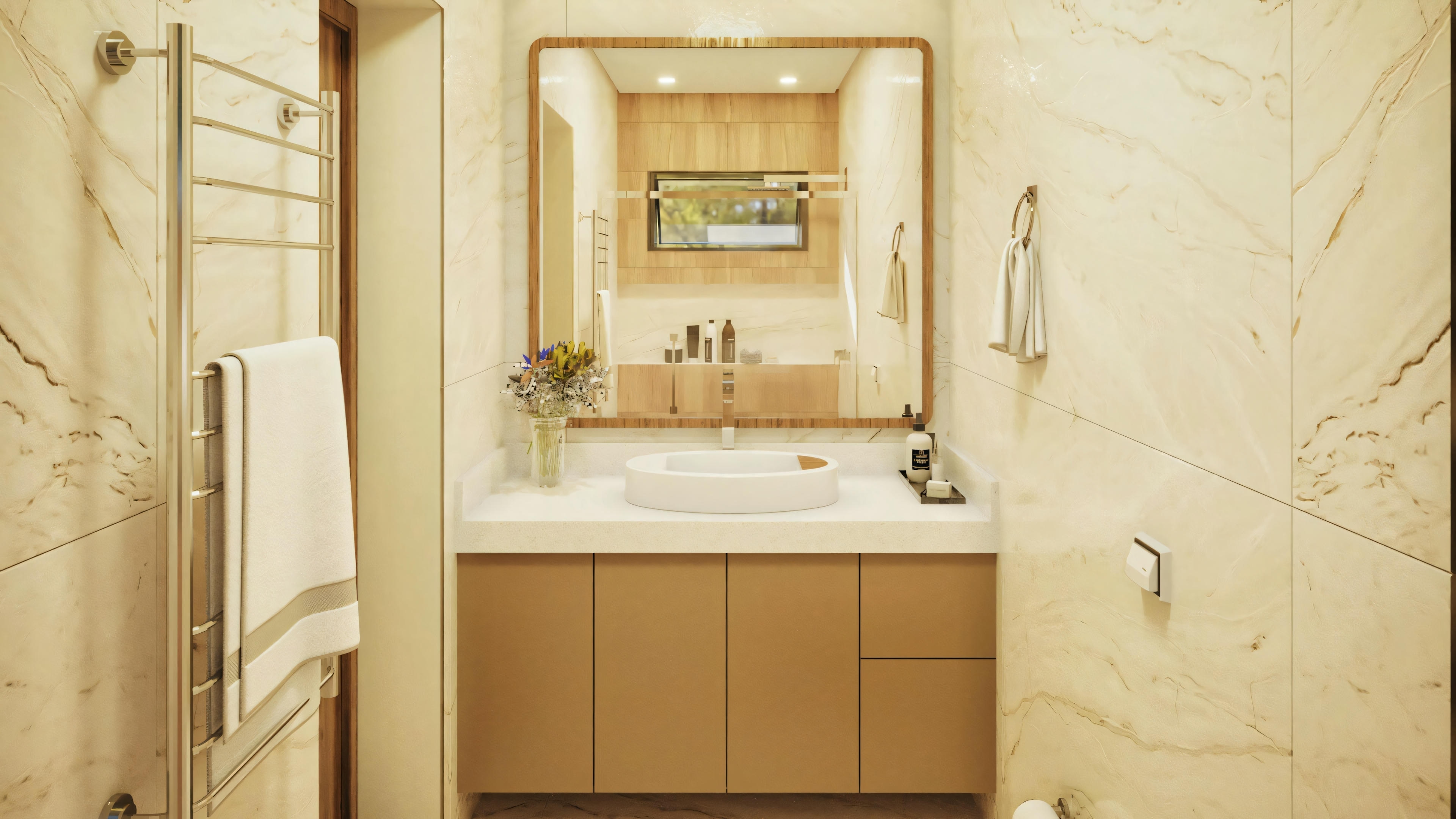 Un baño con lavabo, espejo y toallas colgadas en la pared.