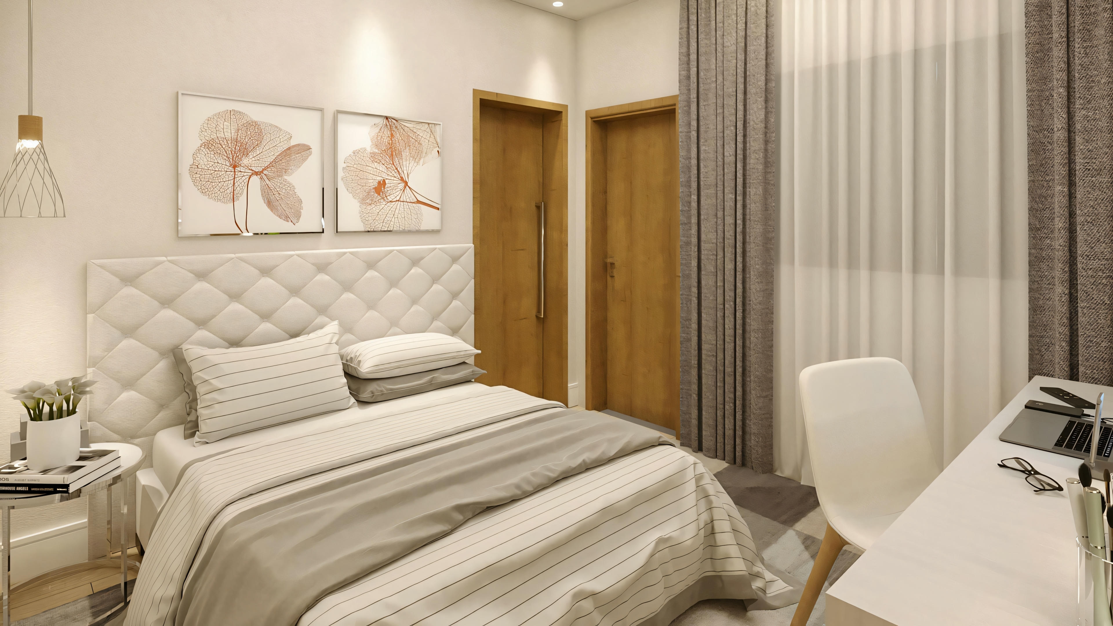 Un dormitorio moderno con una cama grande en el centro, cabecero tapizado y ropa de cama a rayas. Hay dos cuadros enmarcados encima de la cama, un par de puertas de madera a un lado y una mesa con silla al otro.