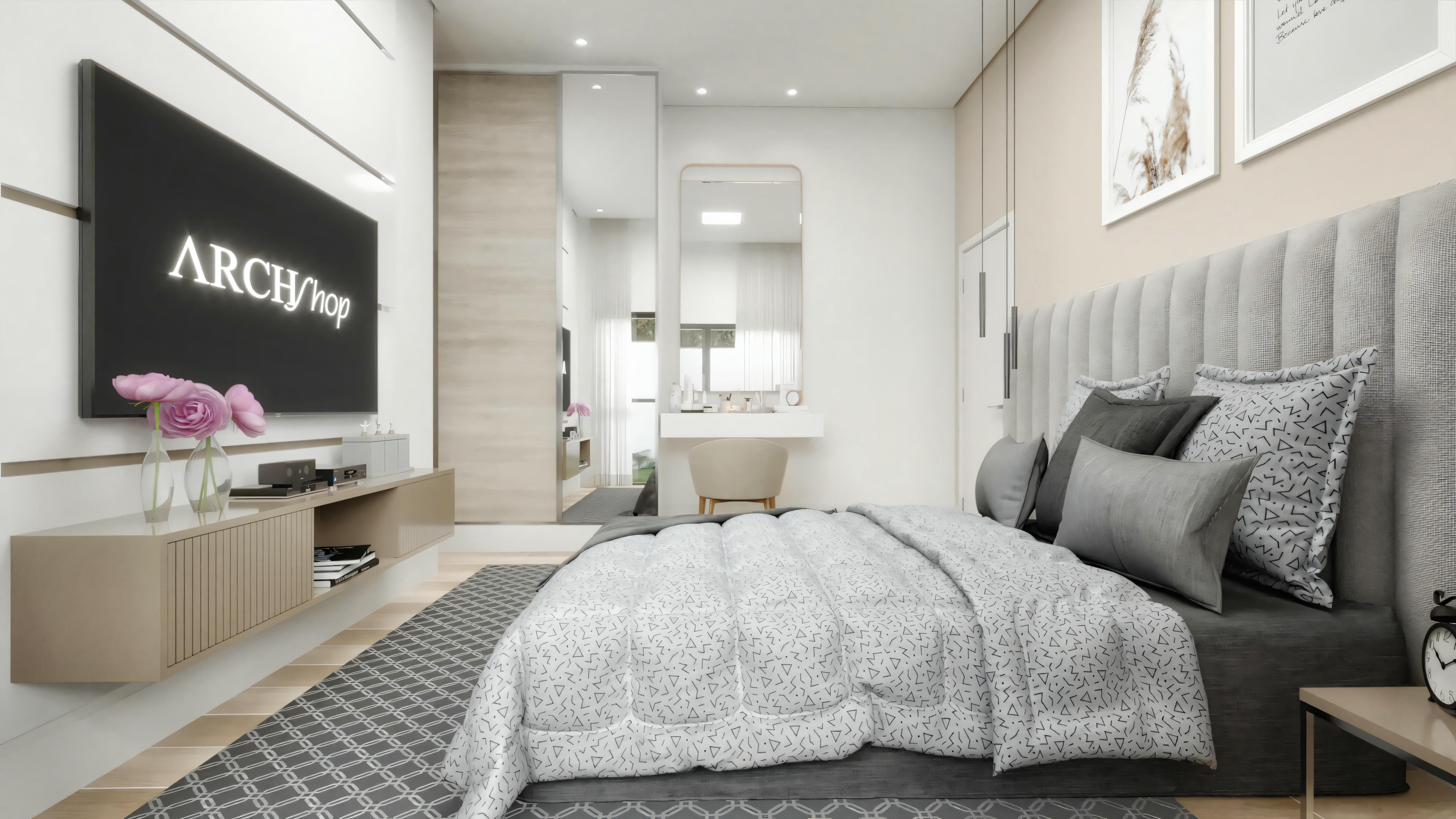 Modern bedroom with a bed of gray bedding, a wall-mounted flat-screen television, and a wardrobe with sliding doors.