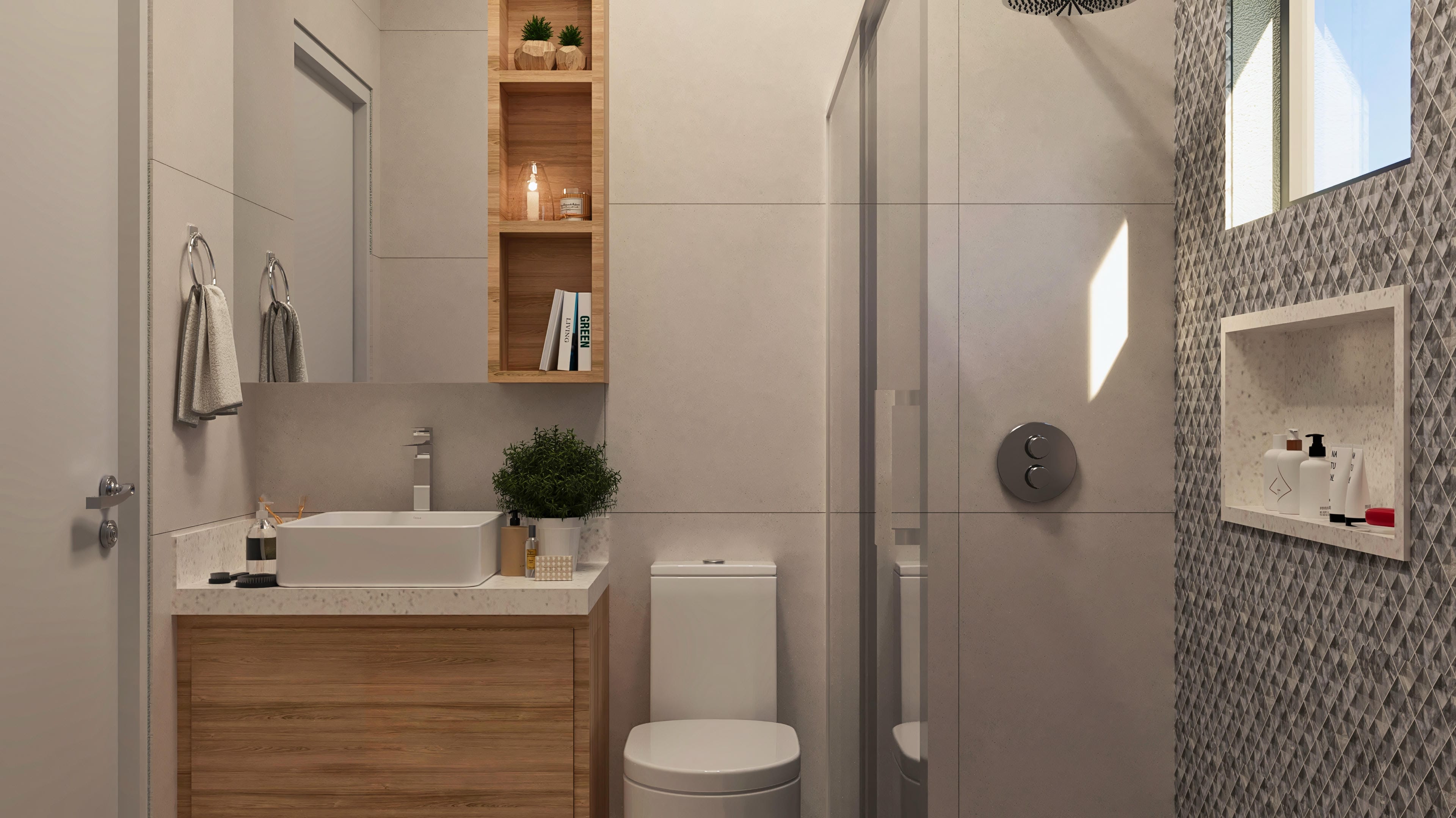 Interior de baño moderno con encimera de mármol, amplio espejo, hornacina con iluminación y sanitarios de diseño limpio.