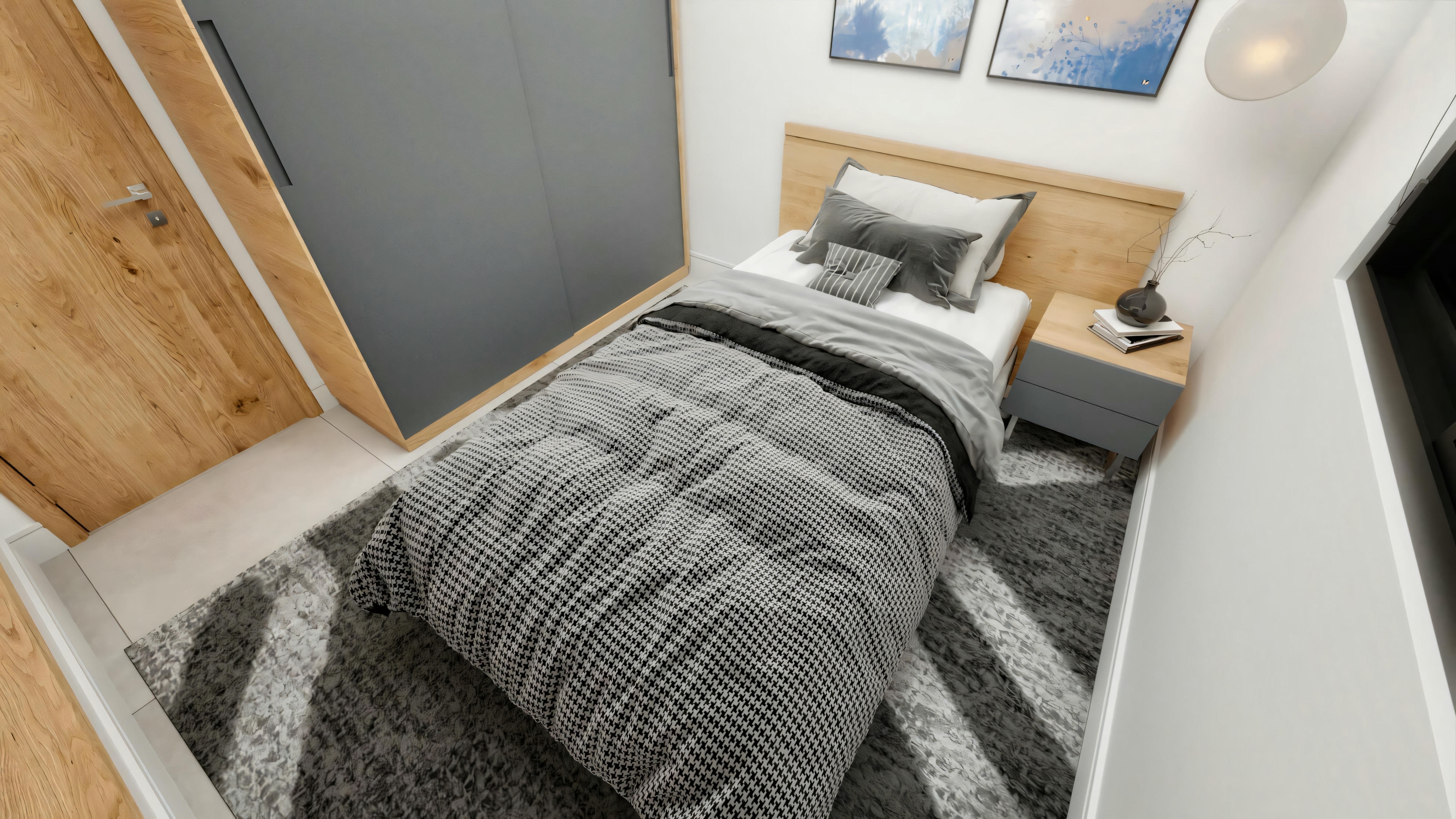 Vista superior de dormitorio individual en casa de campo con cama individual, mesita de noche moderna y alfombra de pelo gris.